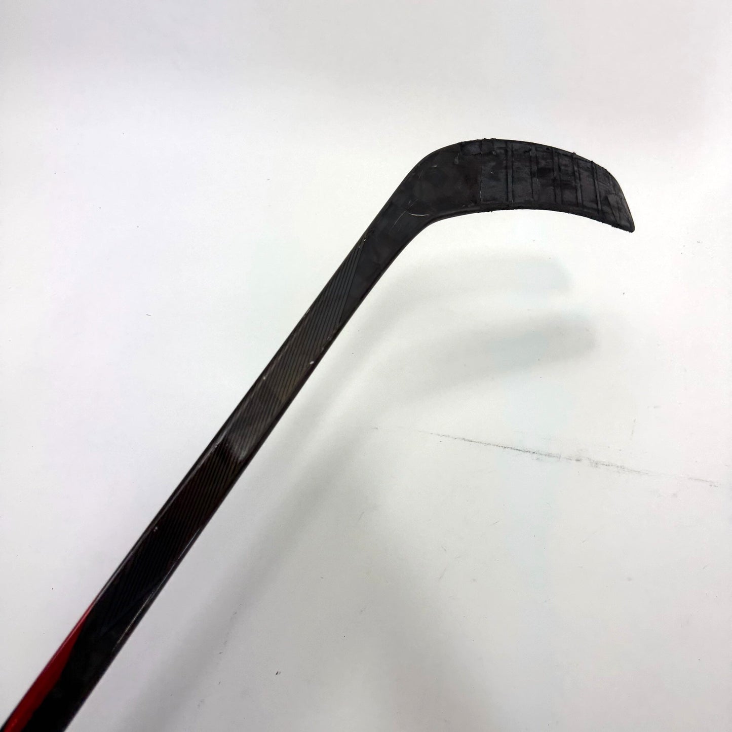 Used Left Red Bauer Nexus Tracer | 87 Flex Custom P88 Curve Grip | Toninato | BH149