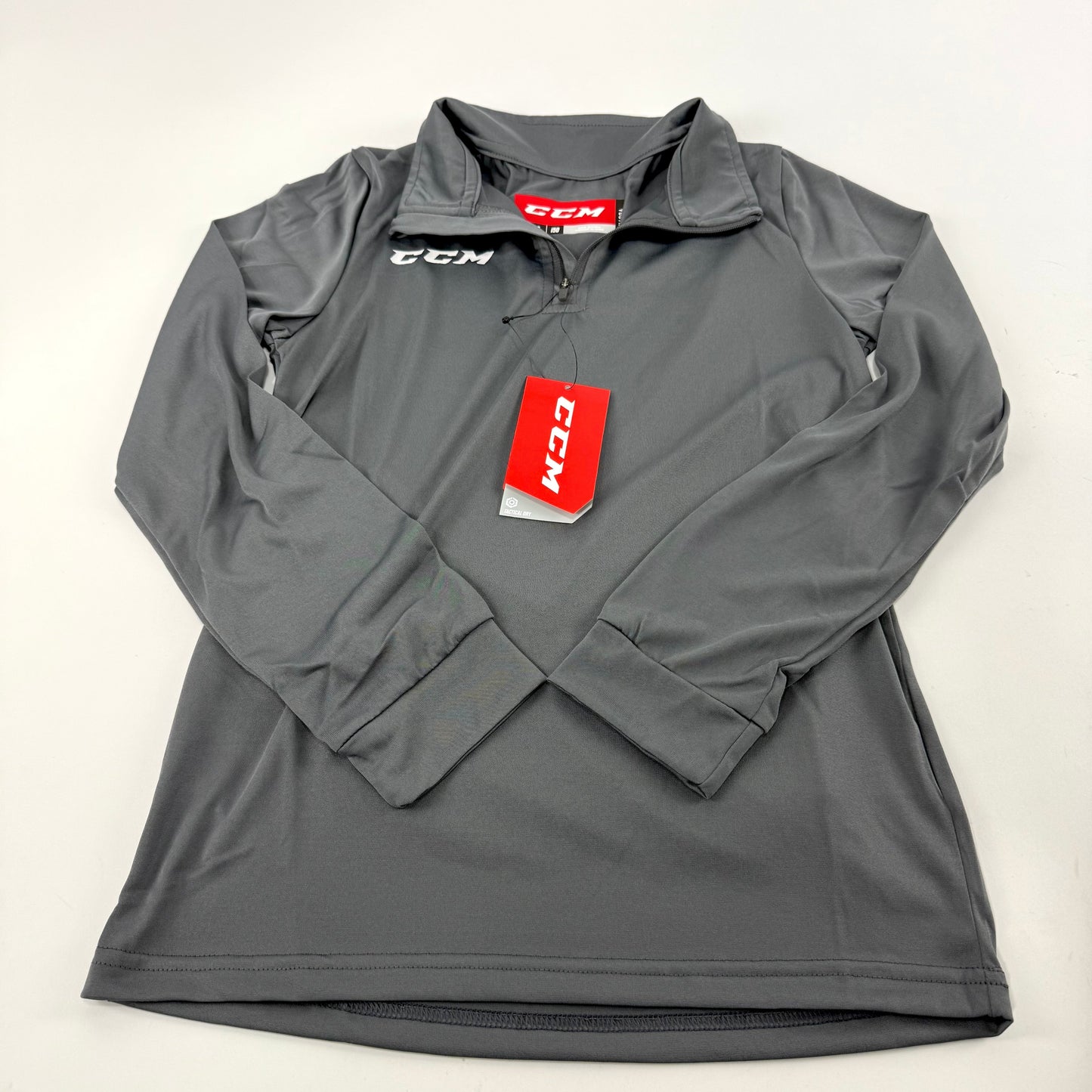 New Dark Grey CCM Youth Training 1/4 Zip Tech Top | Youth L | #888600324852