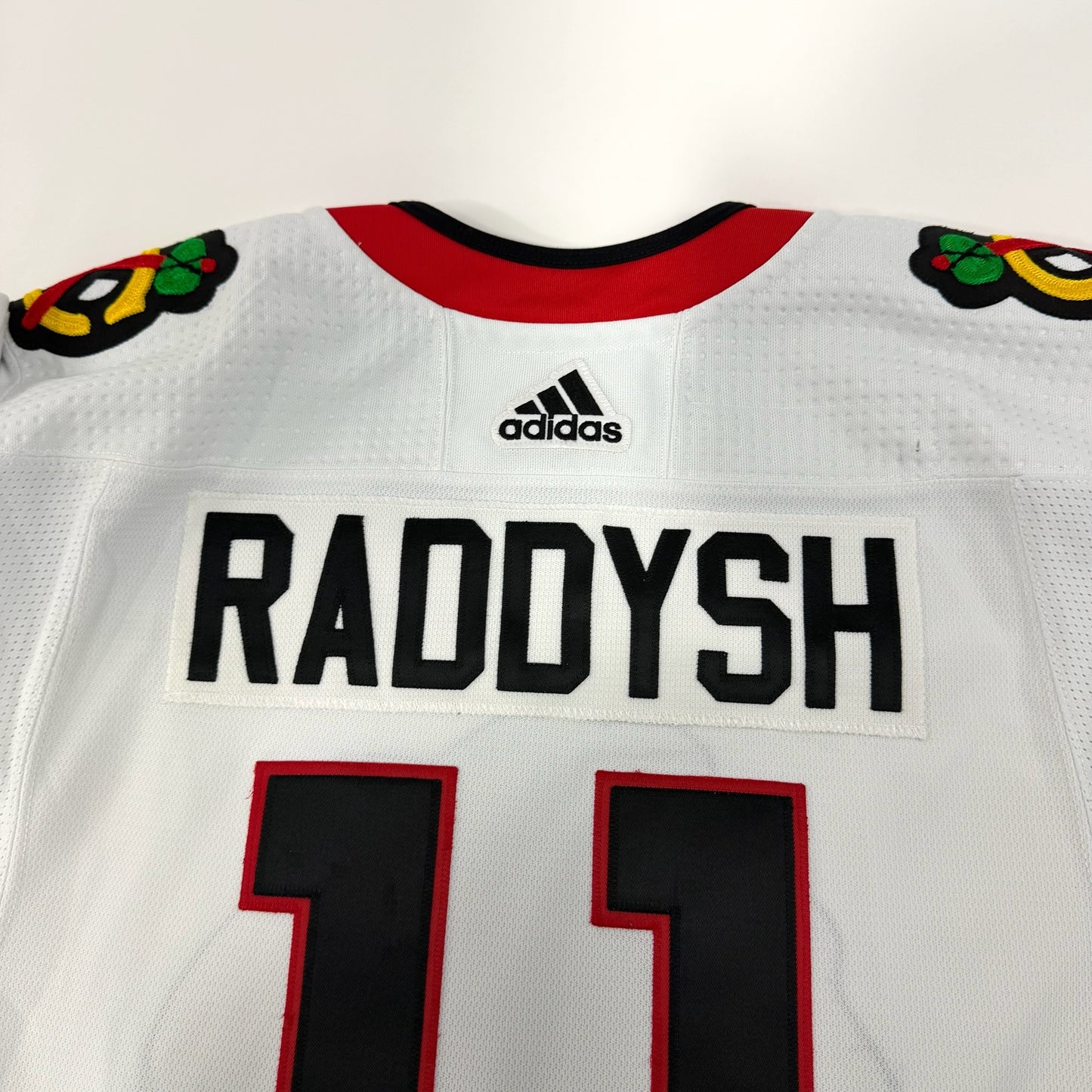 Taylor Raddysh #11 Away Chicago Blackhawks Game Worn Jersey 2022-2023, Set 1 | Size 56 | 4098-25517