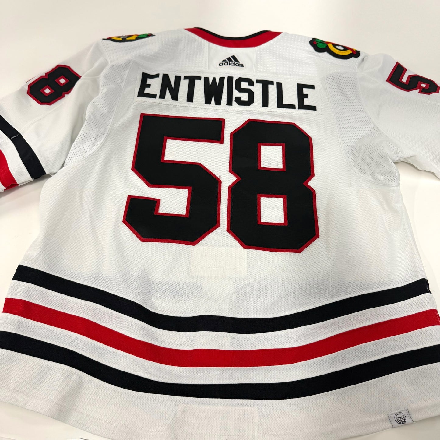 MacKenzie Entwistle #58 Away Chicago Blackhawks Game Worn Jersey 2022-2023, Set 2 | Size 58 | 915-25513