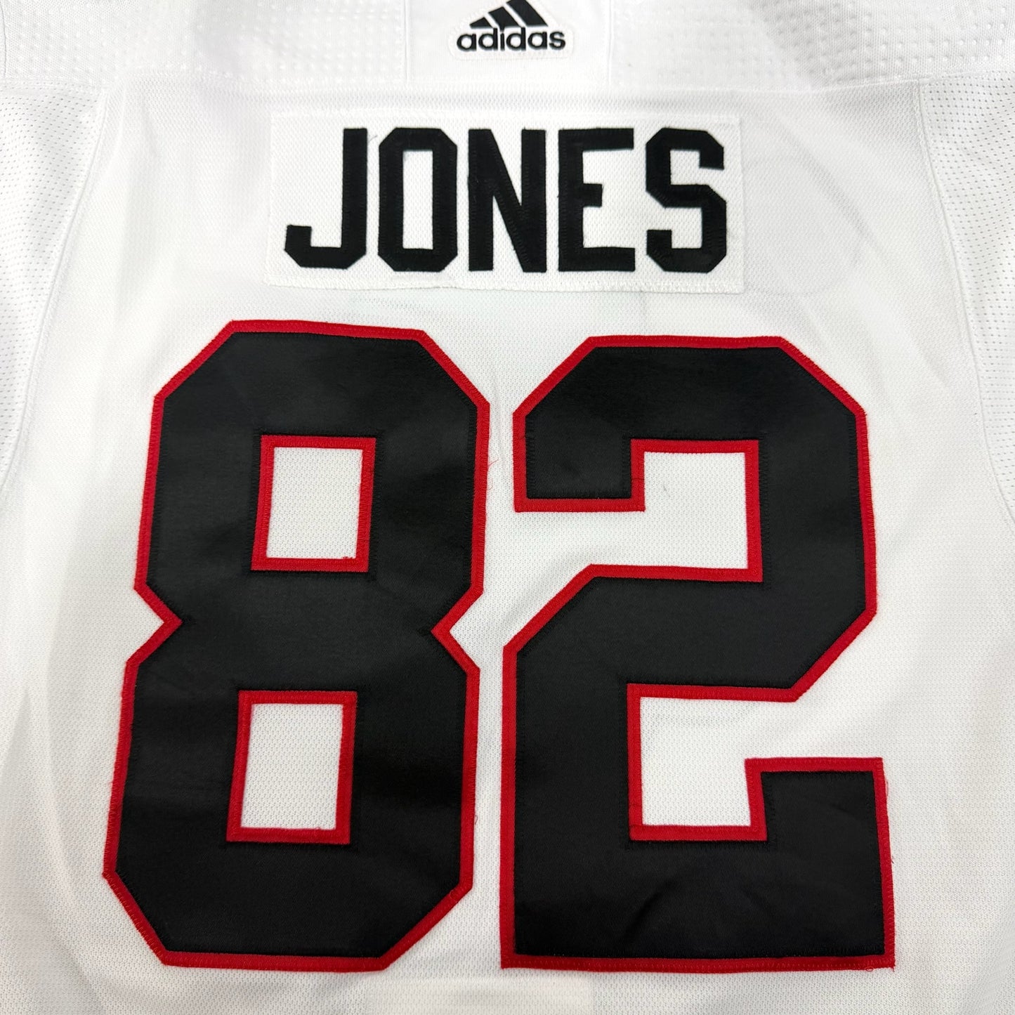 Caleb Jones #82 Away Chicago Blackhawks Game Worn Jersey 2021-2022, Set 1 | Size 58 | 3249-25559