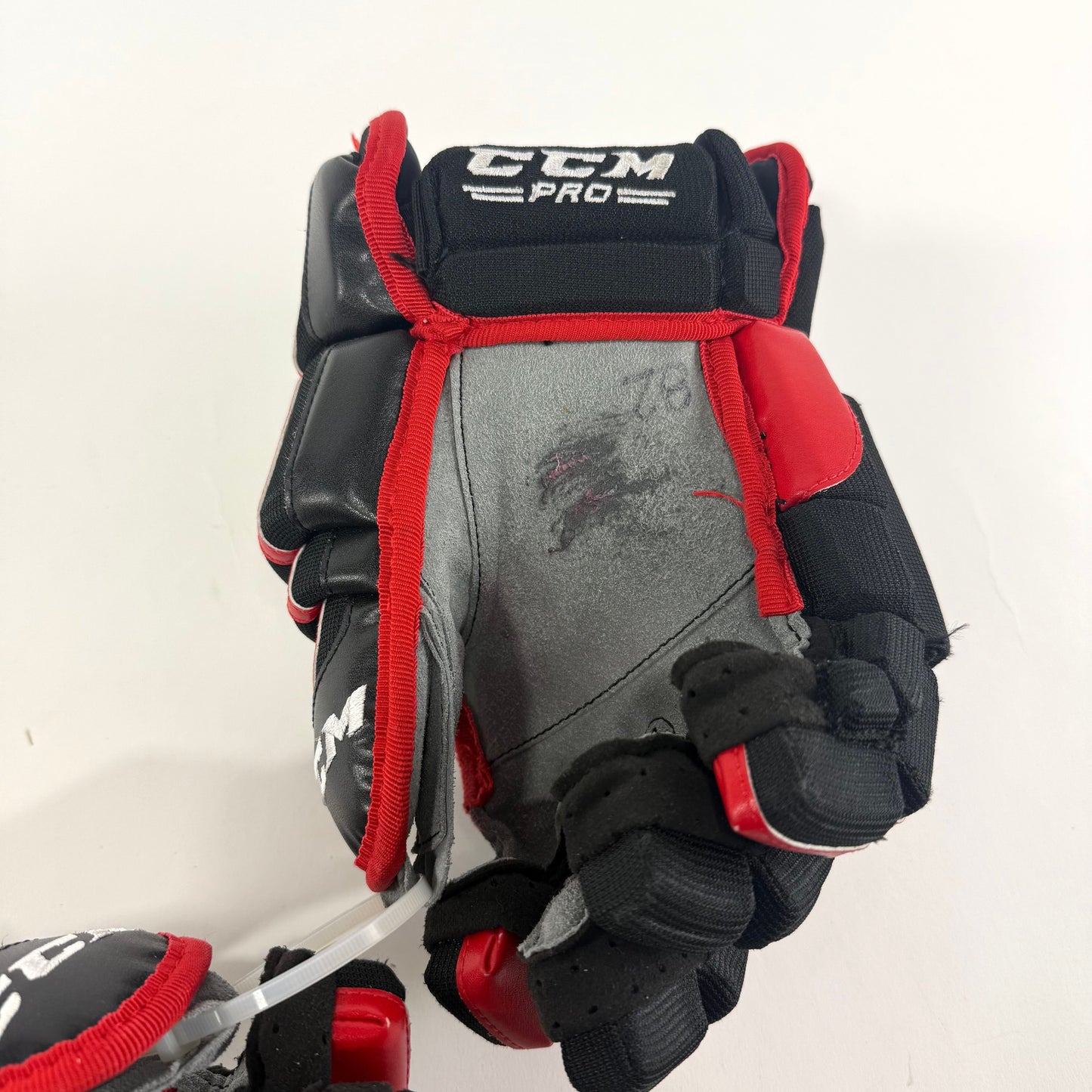Used Chicago Blackhawks CCM HGCL 13" Gloves | Caleb Jones | L362