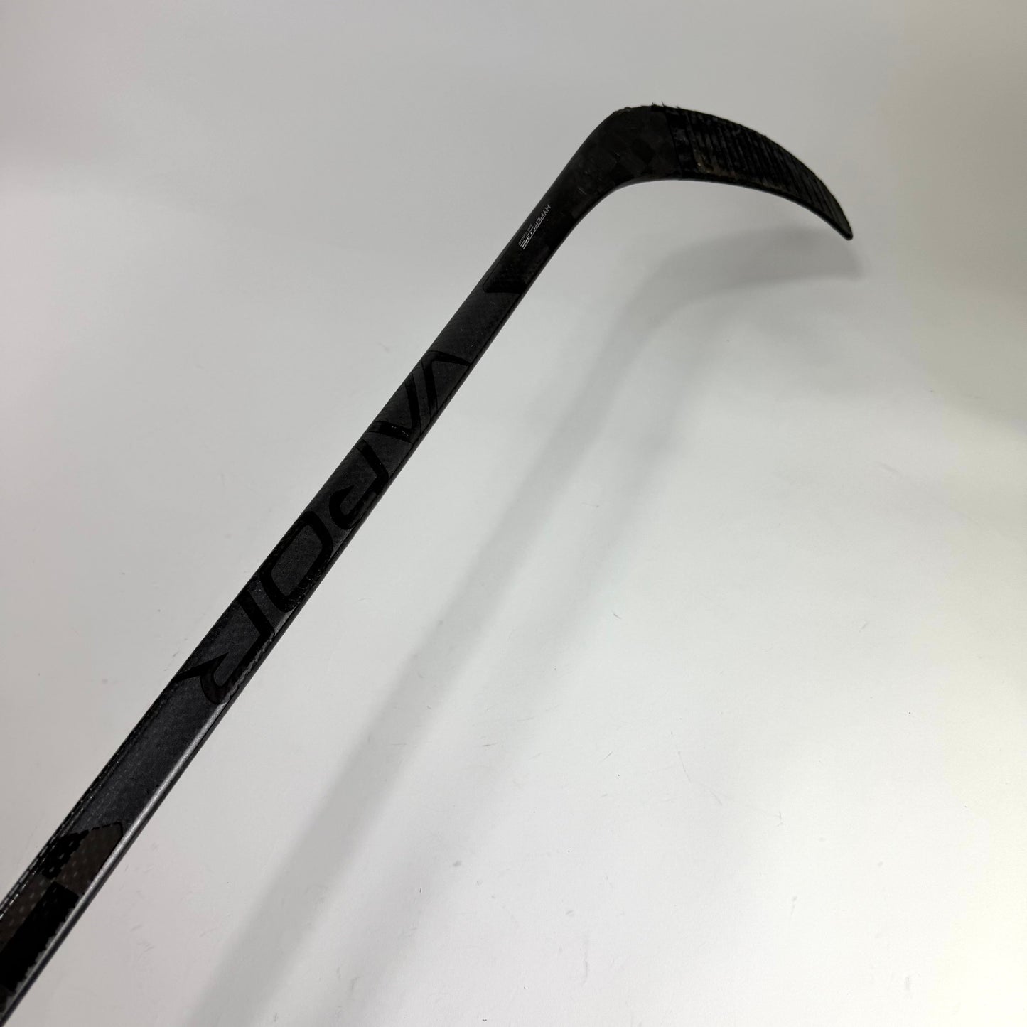 Used Left Silver Bauer Vapor Hyperlite | 77 Flex P92M Curve Grip | E757
