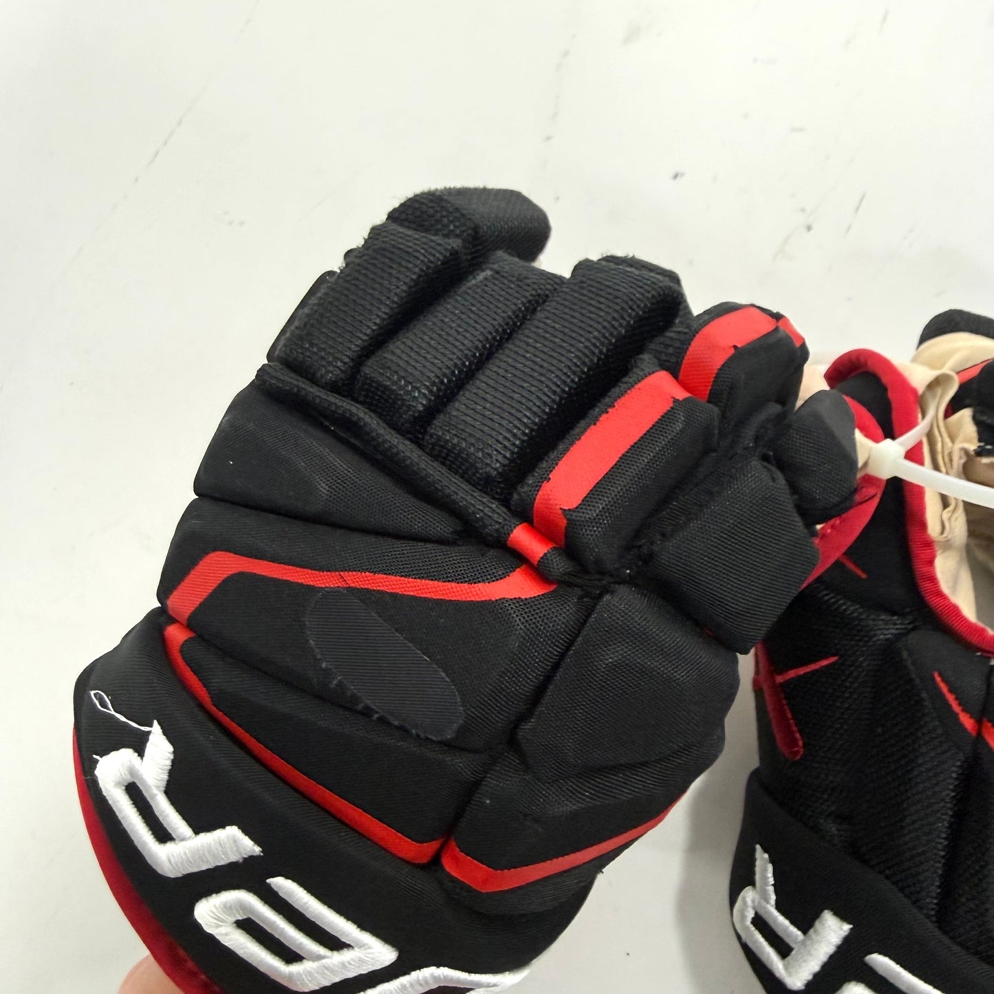Used Black and Red Chicago Blackhawks Bauer Hyperlite Gloves | 13" | Nick Foligno | BH276 - Top Flight Hockey
