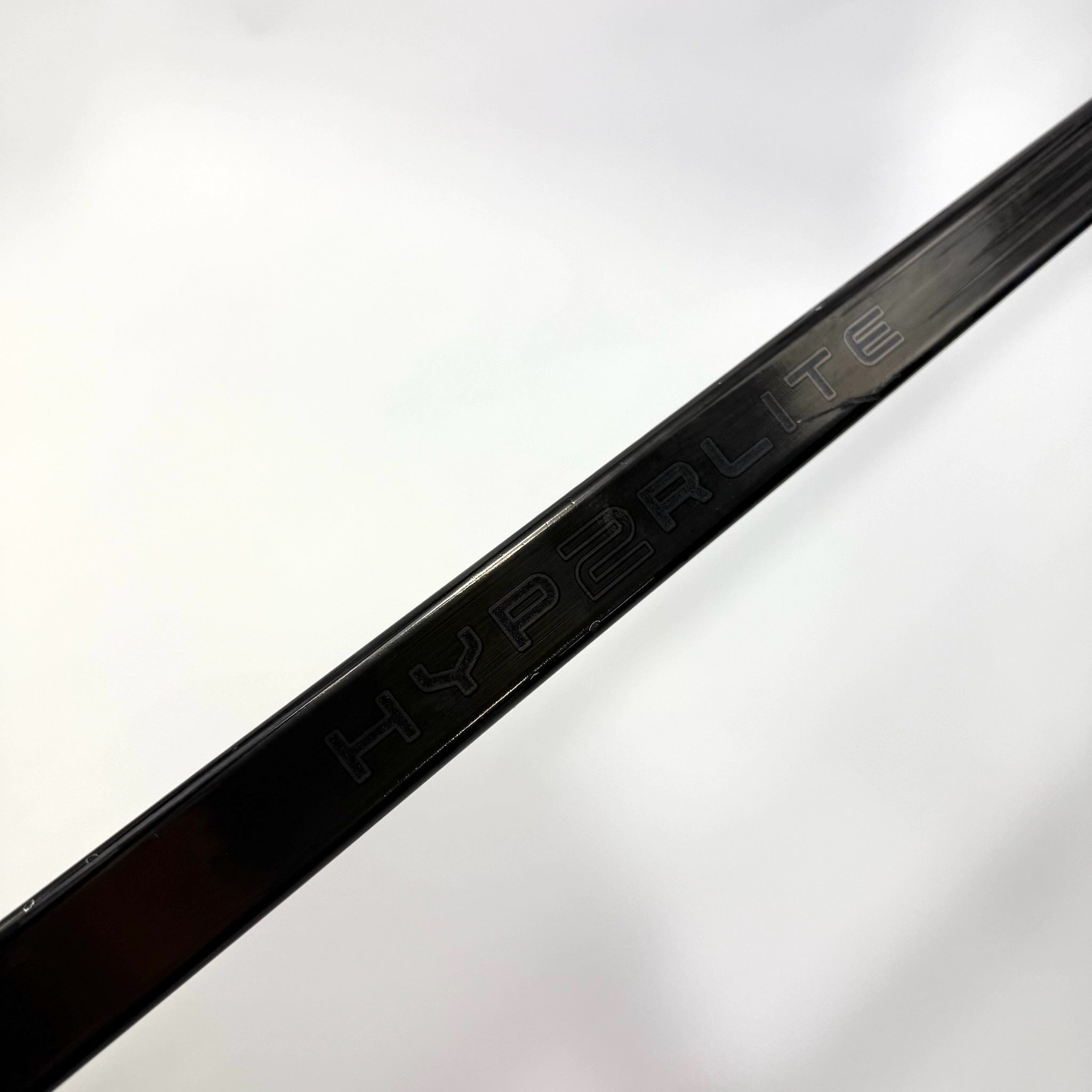 Used Left Black Bauer Vapor Hyperlite 2 | 107 Flex P92M Curve Grip | BH411 - Top Flight Hockey