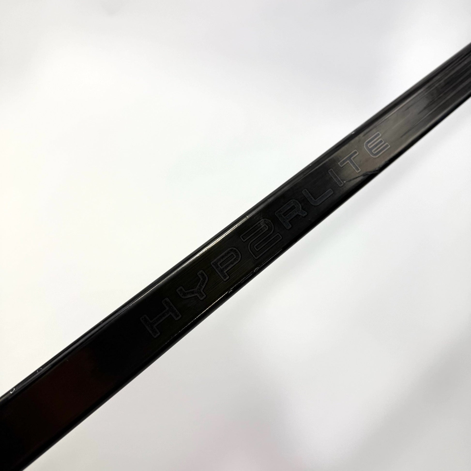 Used Left Black Bauer Vapor Hyperlite 2 | 107 Flex P92M Curve Grip | BH411 - Top Flight Hockey
