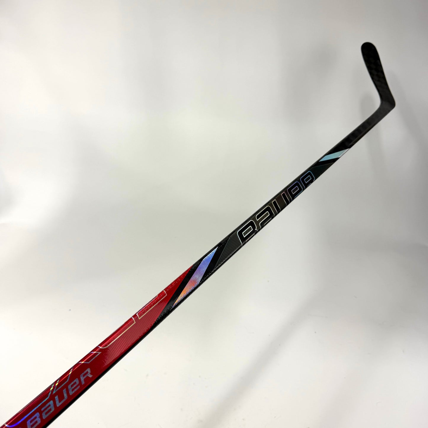 Used Left Red Bauer Nexus Tracer | 70 Flex P90TM Curve Grip | F370