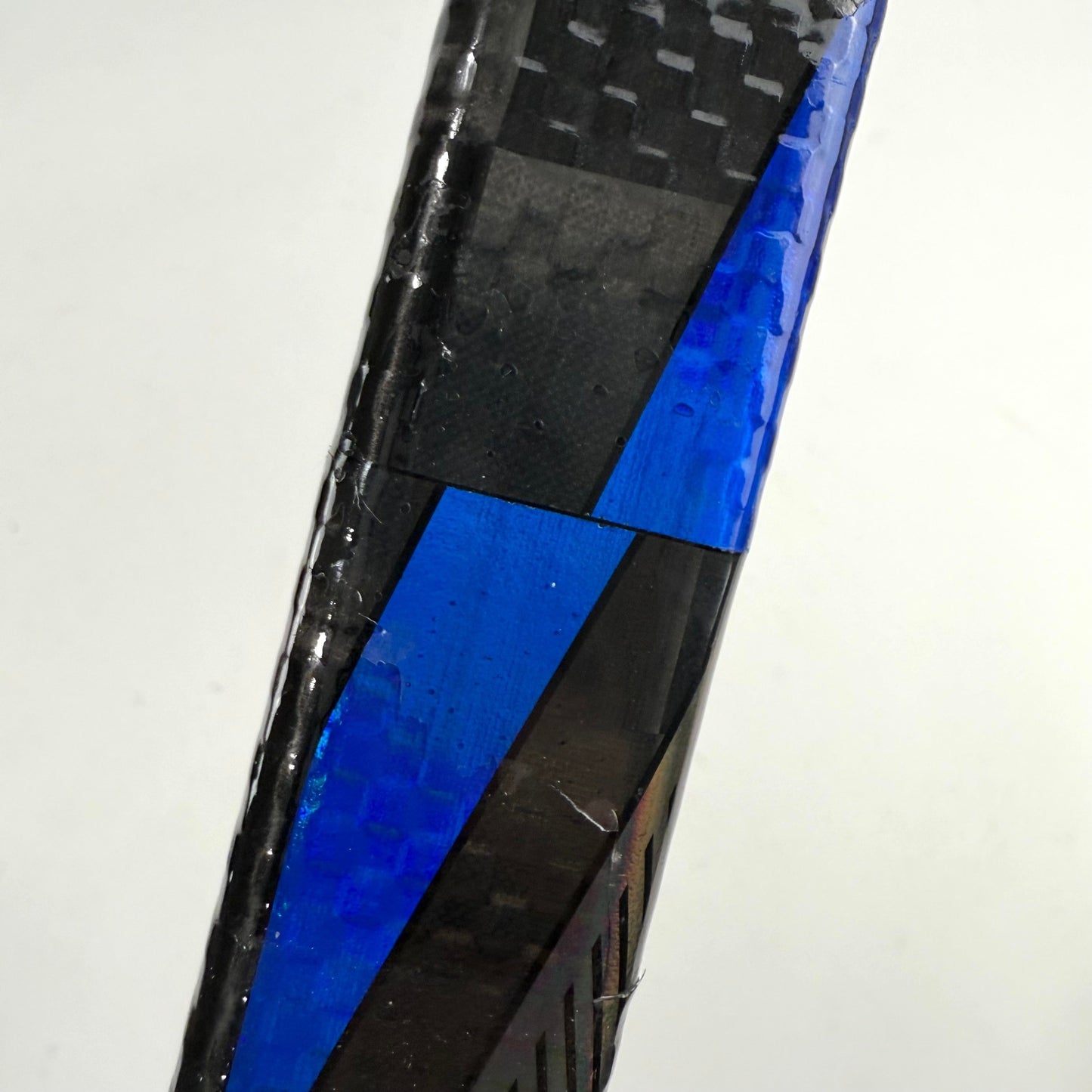 Repaired Left Blue Bauer Nexus Tracer | 82 Flex P28 Curve Grip | R13