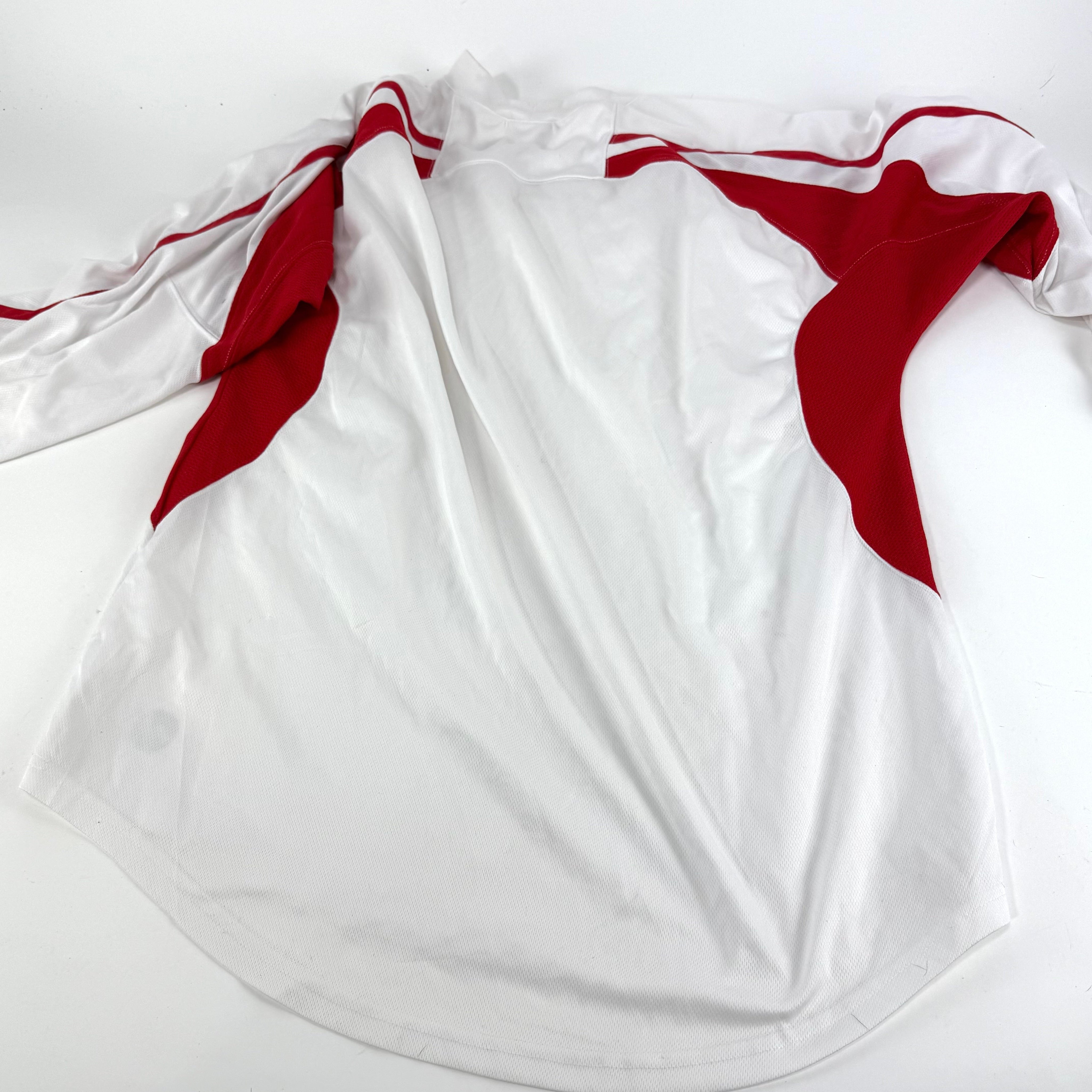 Used White and Red Practice Jersey | XL | U334 - Top Flight Hockey