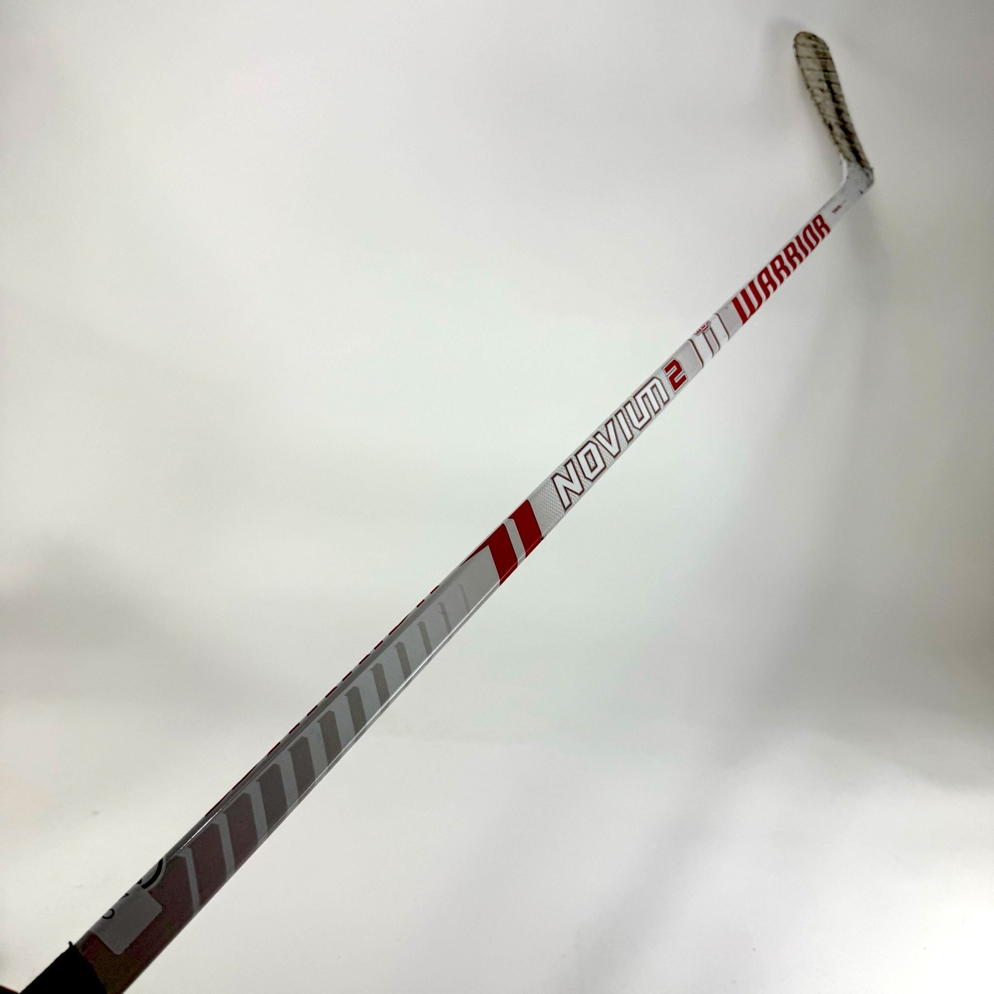 Used Left Warrior Novium 2 SP | 65 Flex W03 Curve Grip | CCM438 - Top Flight Hockey