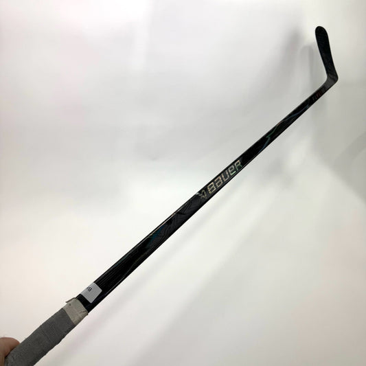Used Left Black Bauer Flylite | 107 Flex New Zegras Pro Curve | Grip | BH410