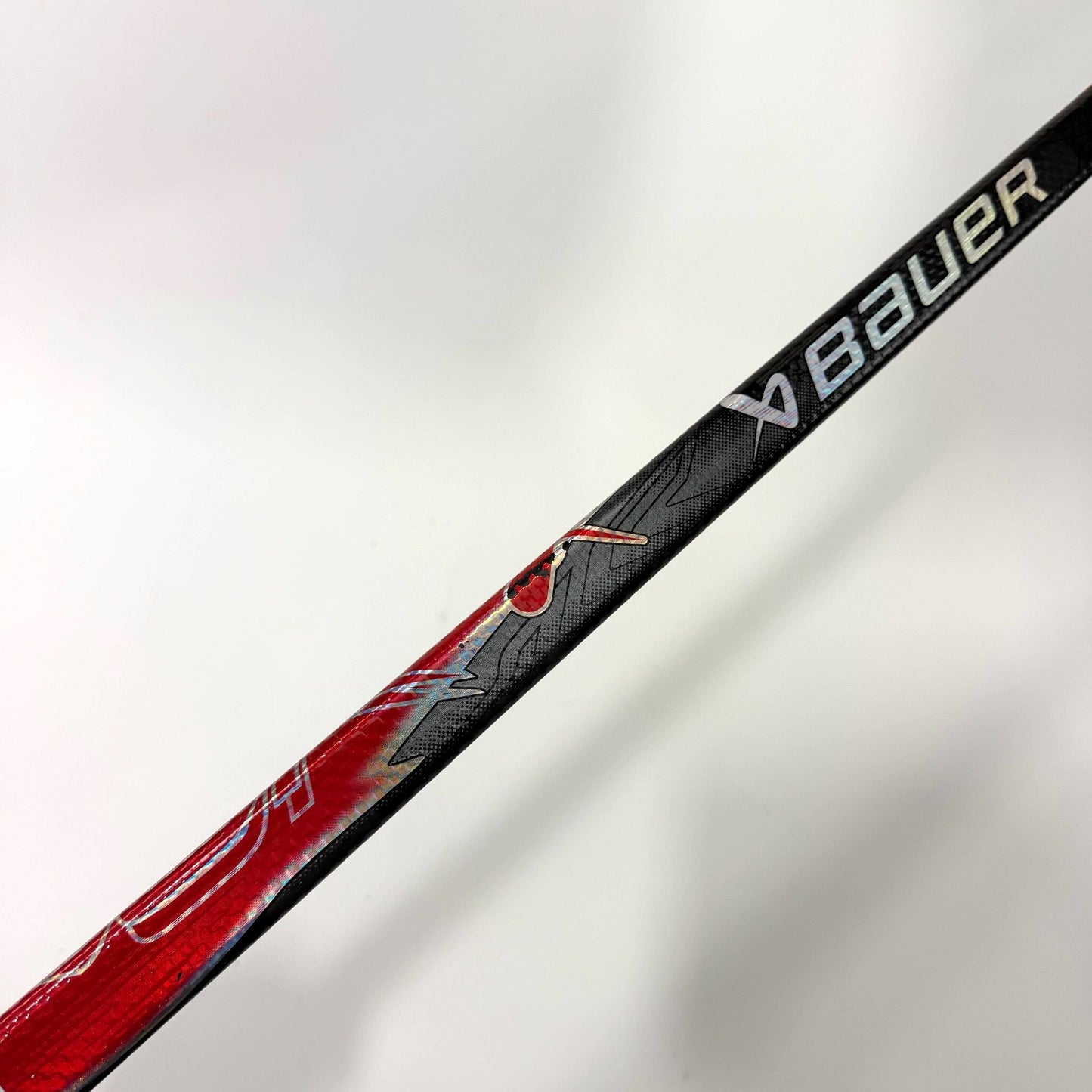 Used Left Red Bauer Flylite | 77 Flex P28M Curve Grip | AB979