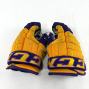 Used Yellow and Purple CCM 4 Roll Pro Gloves | 13" | E542