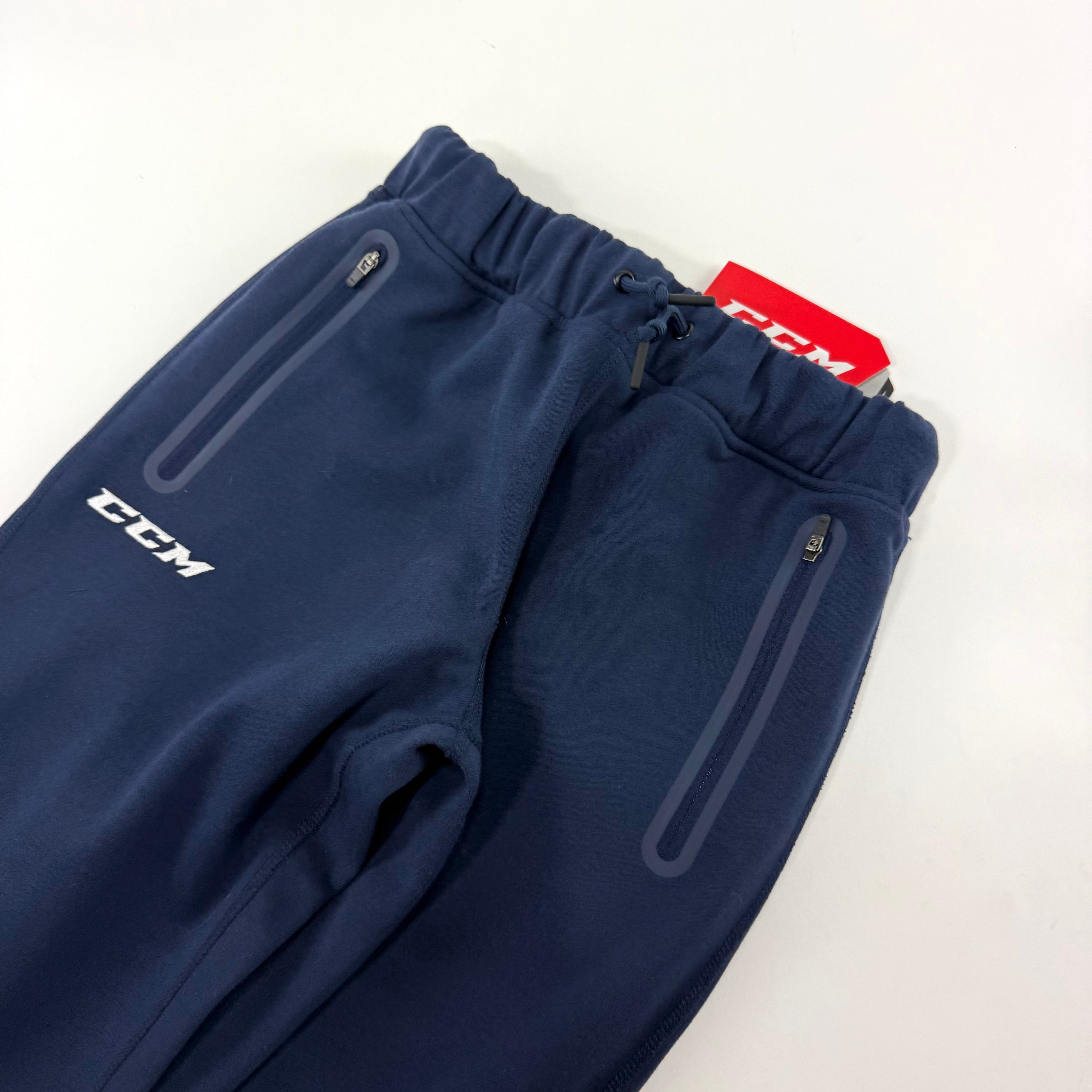 New Navy CCM Youth Premium Tapered Fleece Pant | Youth L | #191520015688 - Top Flight Hockey