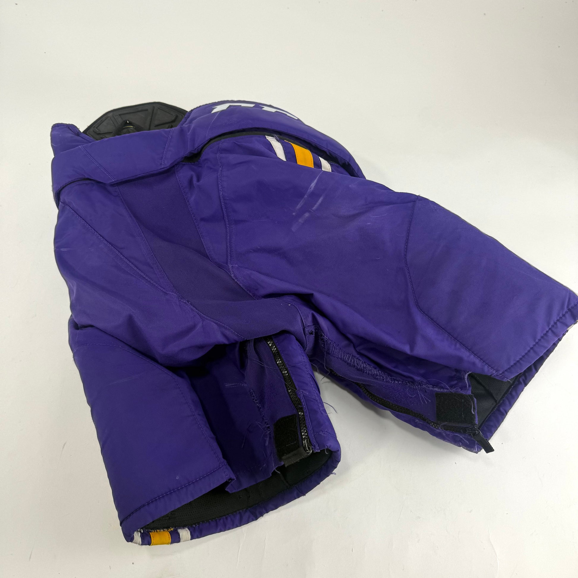 Used Purple/Yellow CCM Tacks 65C Pants | Medium | E539 - Top Flight Hockey