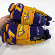 Used Yellow and Purple CCM 4 Roll Pro Gloves | 13" | E542