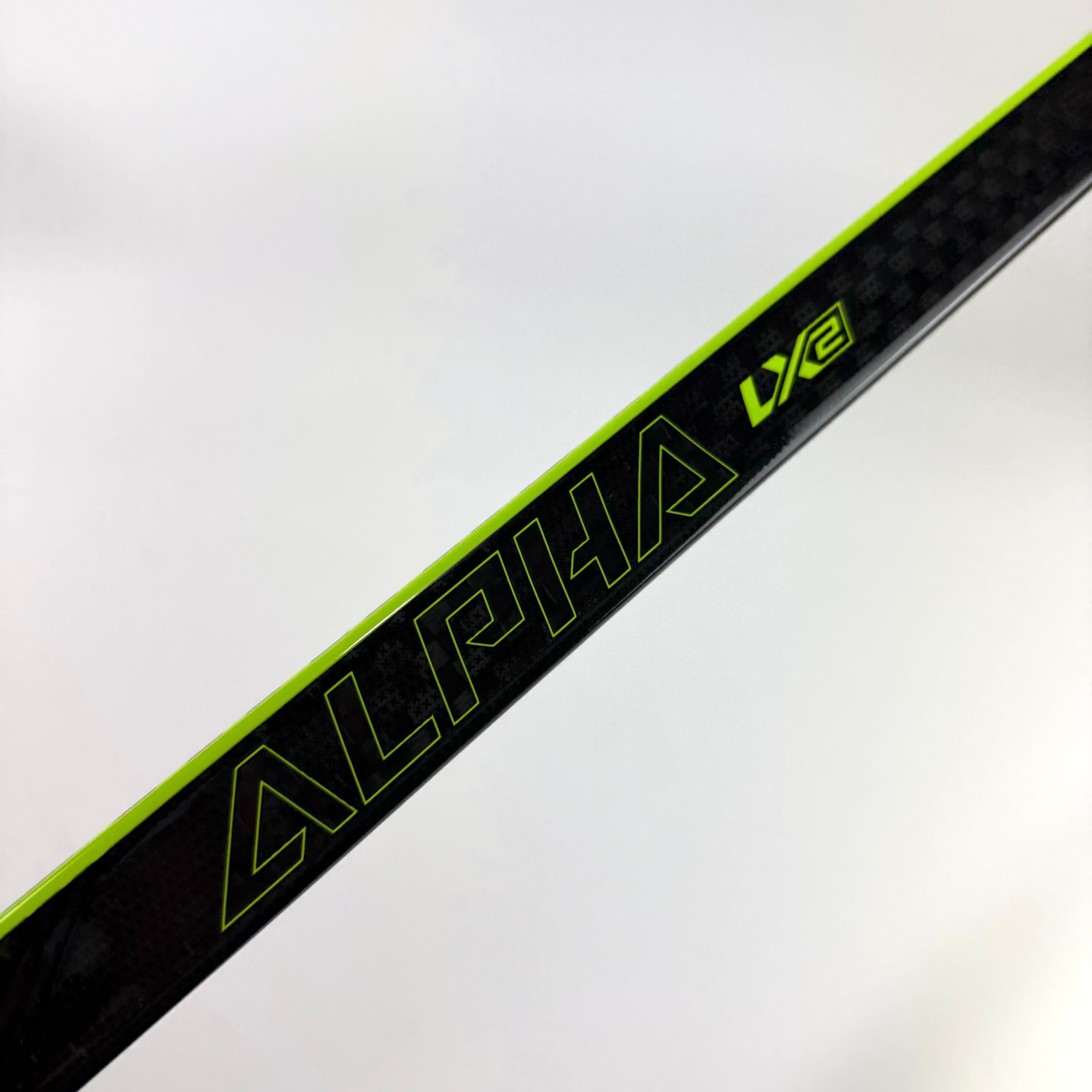 New Left Warrior Alpha LX2 | 75 Flex W90 Curve Grip | R262 - Top Flight Hockey