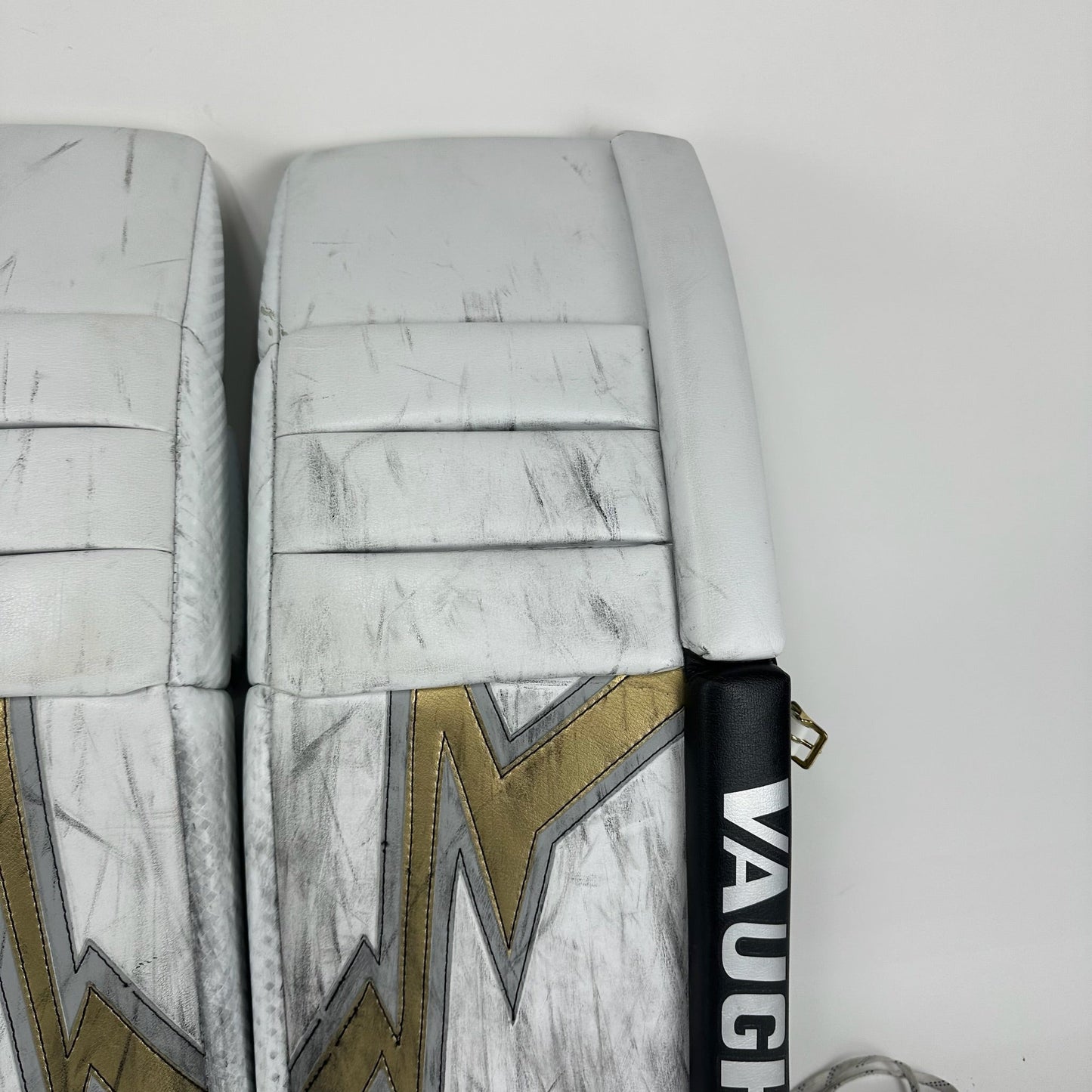 Used Vegas Knights White and Gold Vaughn V9 Goalie Leg Pads | Saville | 35+1" - Top Flight Hockey