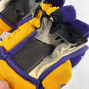 Used Yellow and Purple CCM 4 Roll Pro Gloves | 13" | E560