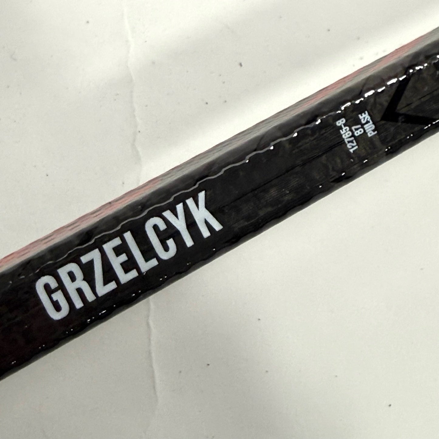 Used Left Red Bauer Pulse | 87 Flex P28 Curve Grip | Matt Gryzelcyk | BH137