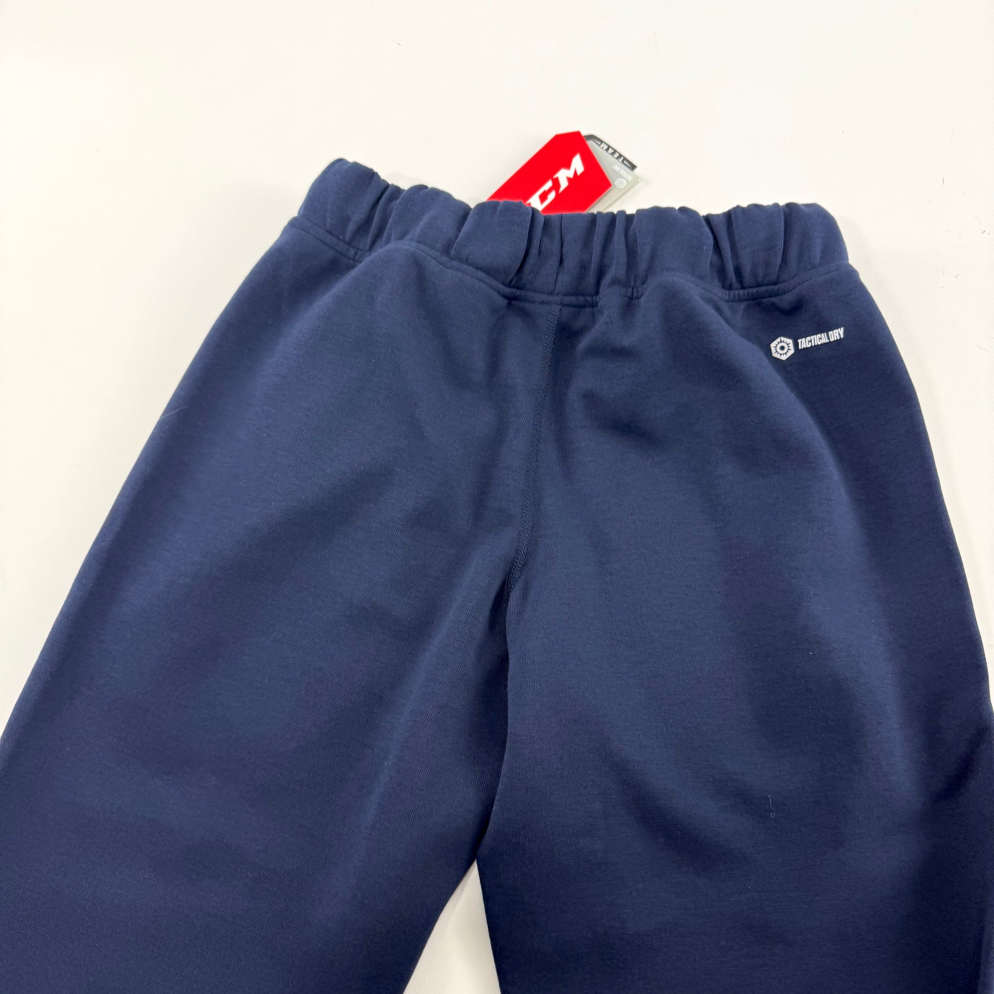 New Navy CCM Youth Premium Tapered Fleece Pant | Youth L | #191520015688 - Top Flight Hockey