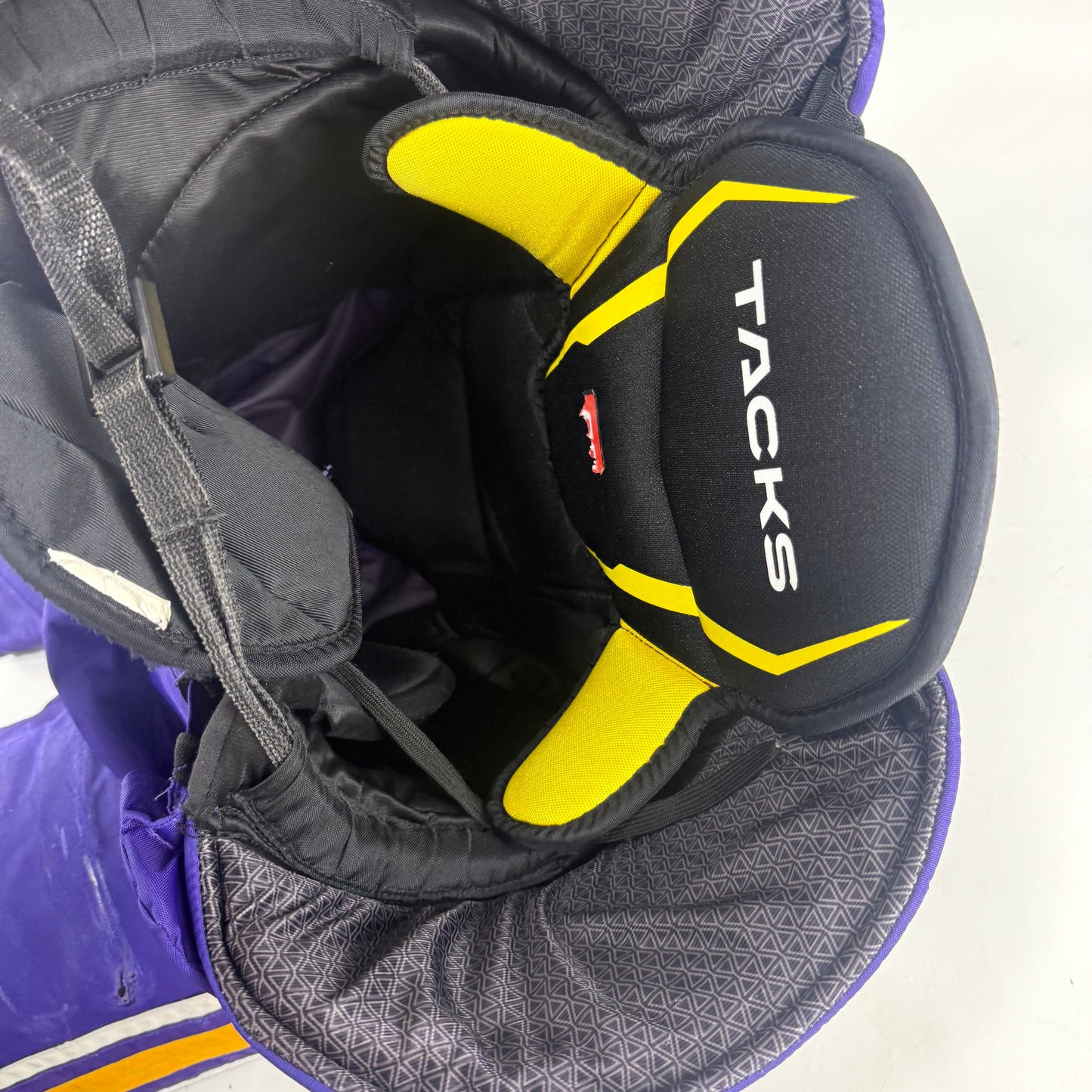 Used Purple/Yellow CCM Tacks 95C Pants | Small | E537