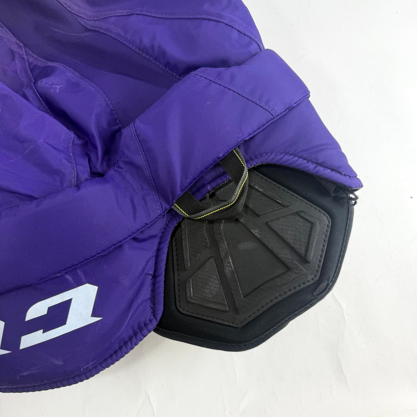 Used Purple/Yellow CCM Tacks 65C Pants | Medium | E548