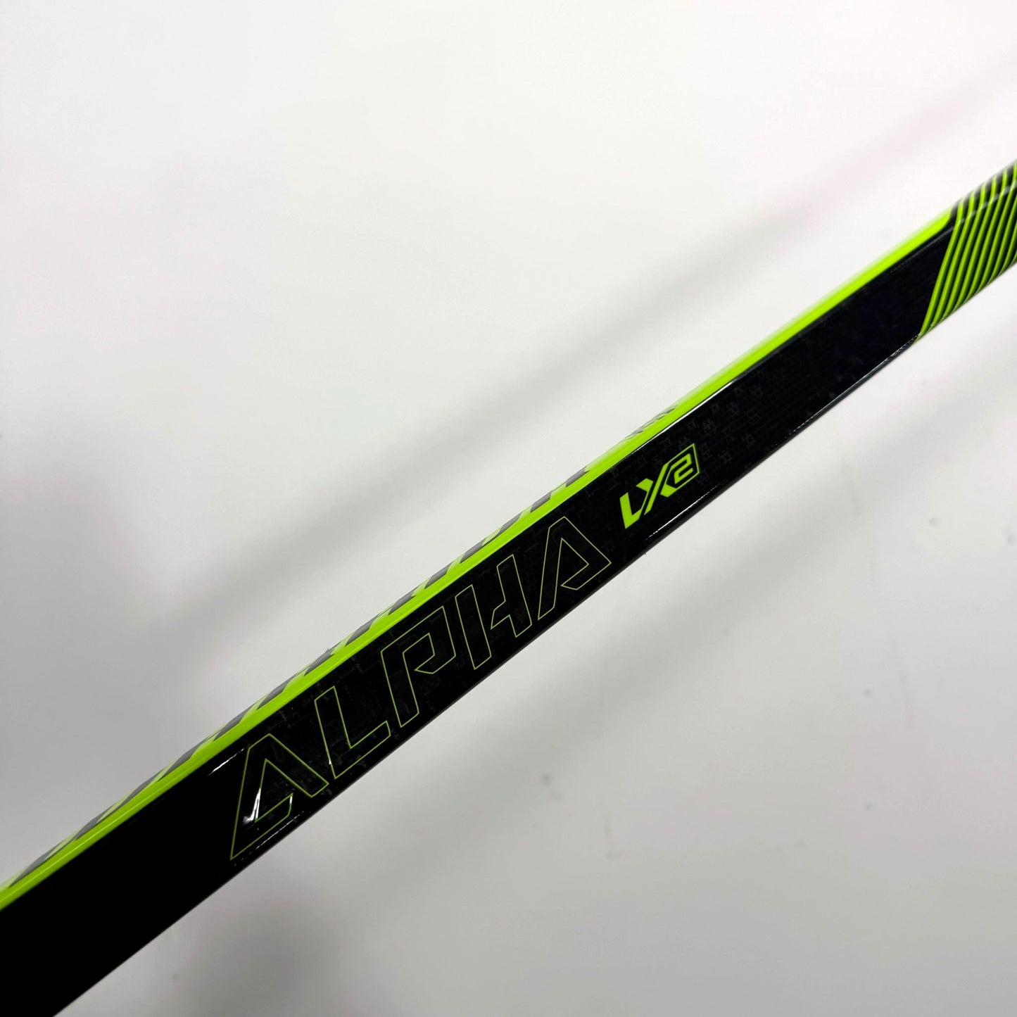 New Left Warrior Alpha LX2 | 75 Flex W03 Curve Grip | BH249 - Top Flight Hockey