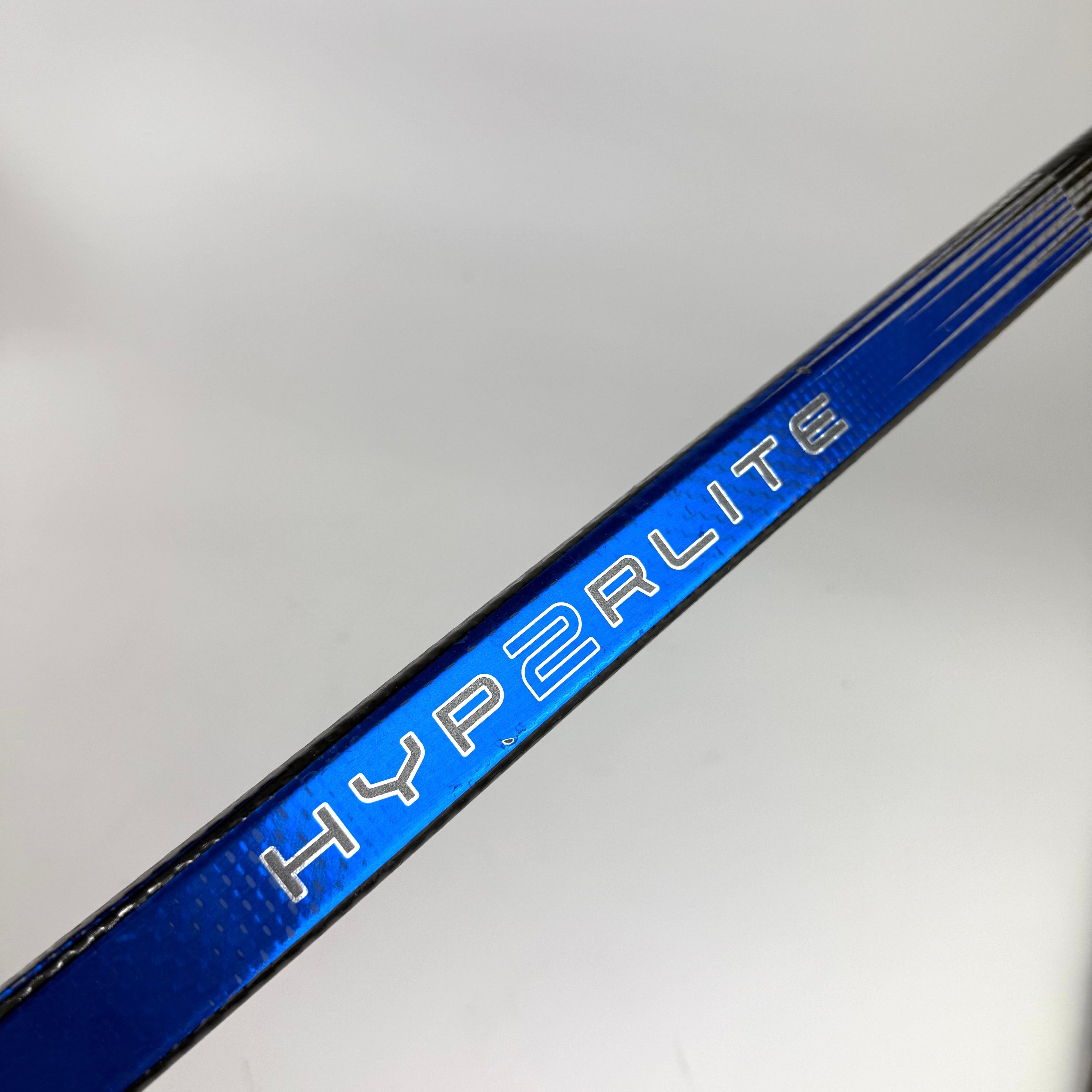 Repaired Left Blue Bauer Vapor Hyperlite 2 | 77 Flex P92 Curve Grip | D18 - Top Flight Hockey