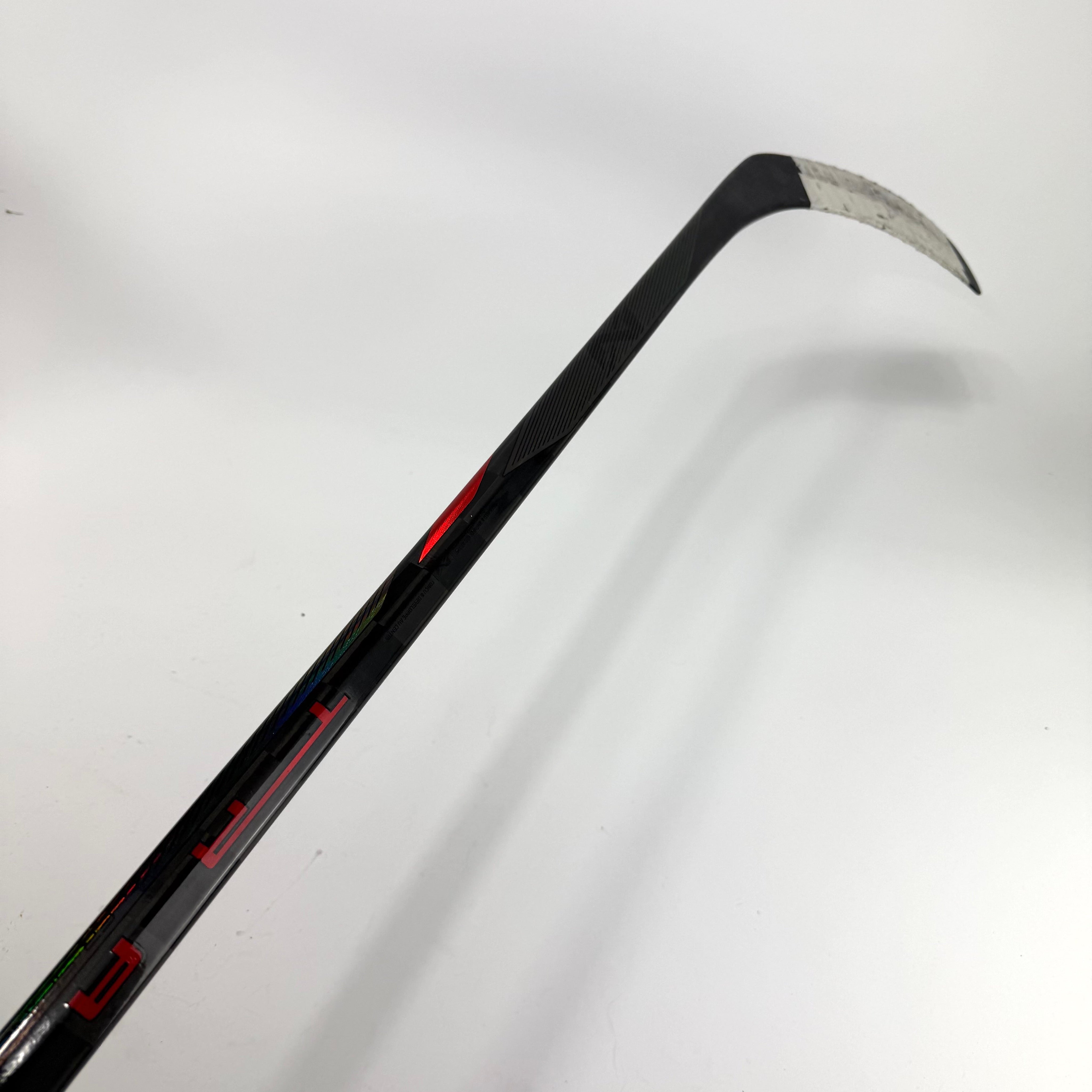 Used Left Red Bauer Nexus Tracer | 65 Flex Kane Pro Curve Grip | R424 - Top Flight Hockey