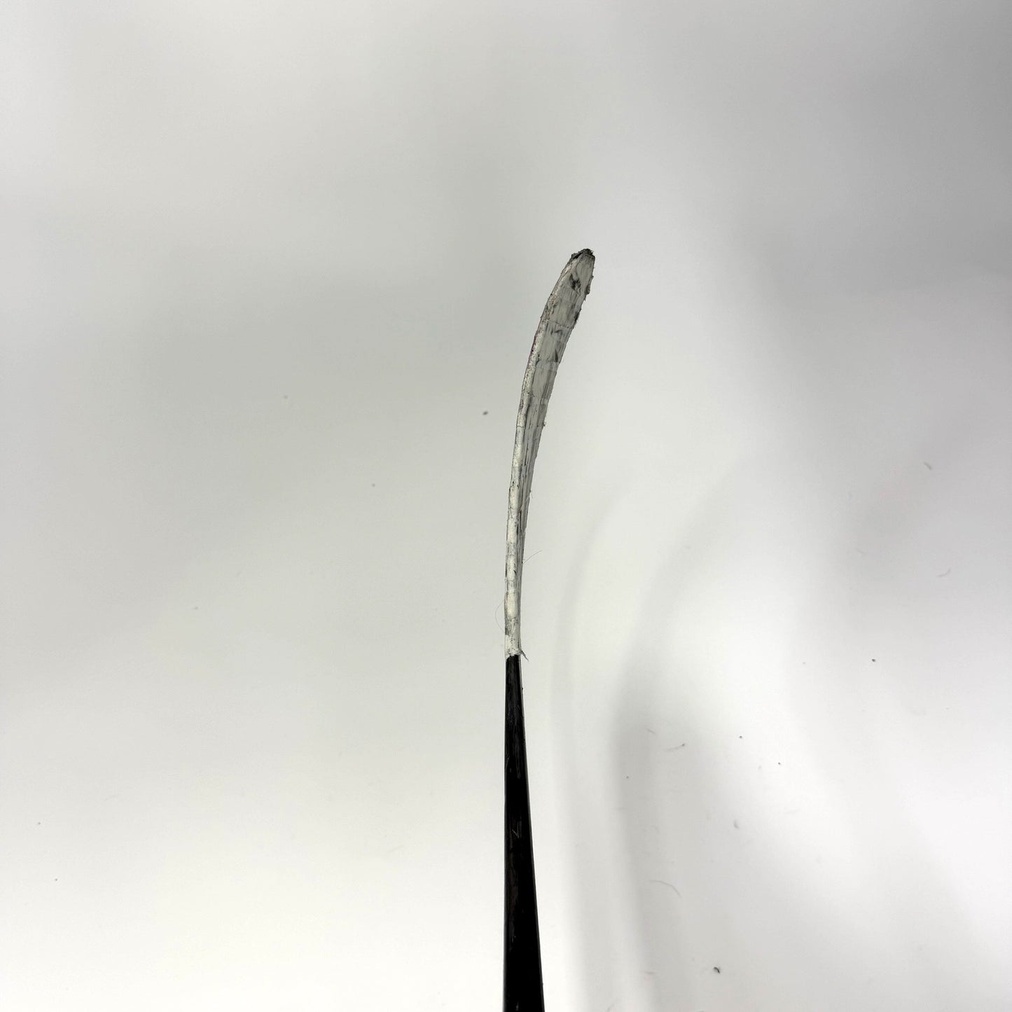 Used Left Red Bauer Nexus Tracer | 55 Flex P28 Curve Grip | AB699
