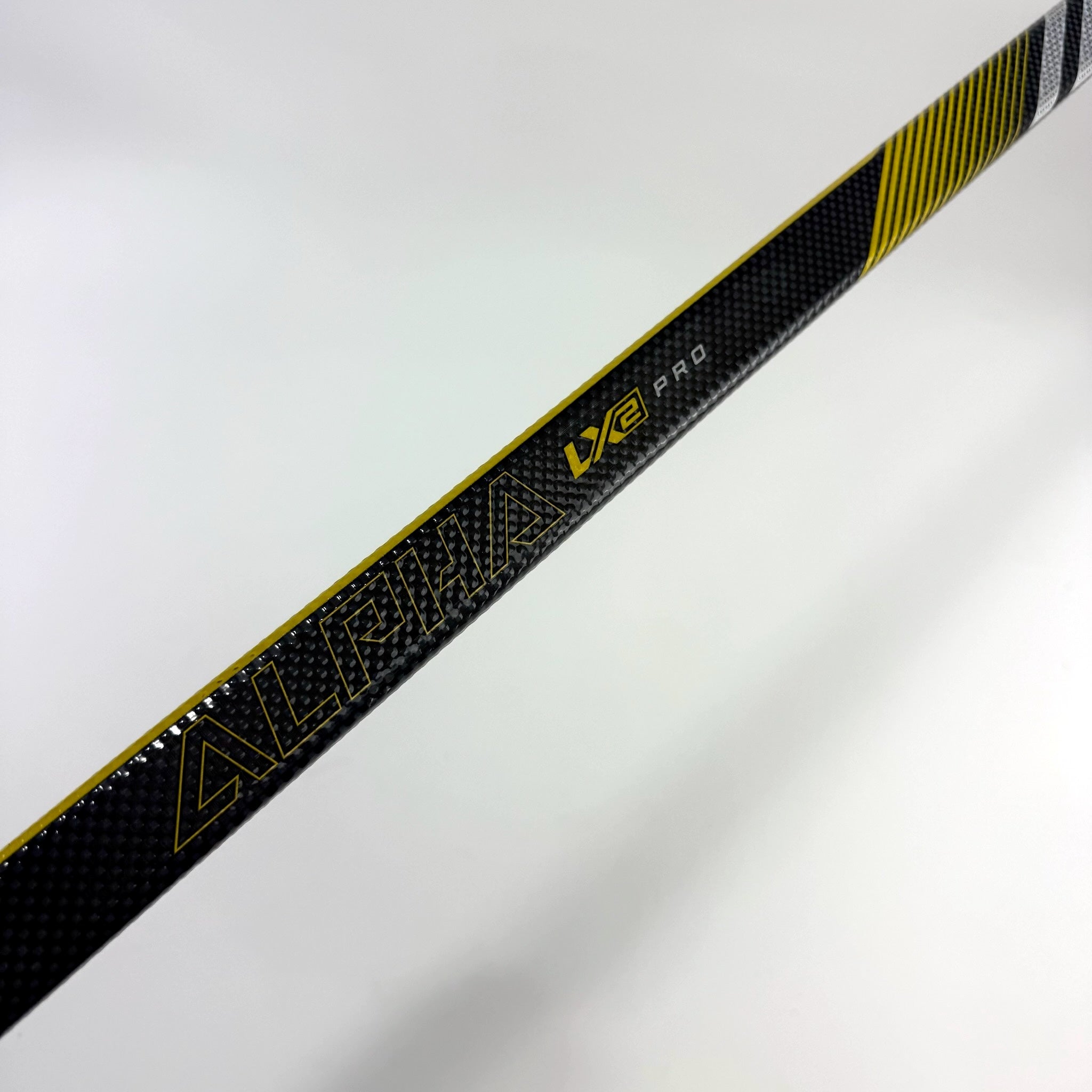 Used Left Yellow Warrior Alpha LX2 Pro | 85 Flex P28 Curve Grip | F361 - Top Flight Hockey
