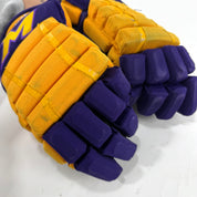 Used Yellow and Purple CCM 4 Roll Pro Gloves | 13" | E560