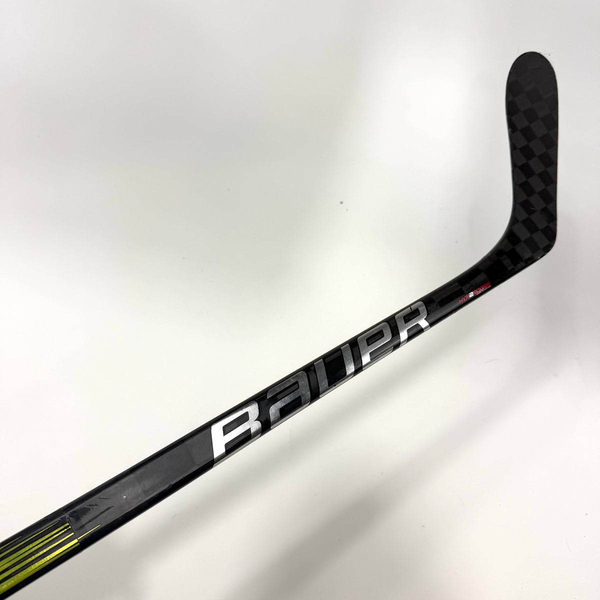 Repaired Left Bauer Vapor Hyperlite 2 | 77 Flex P28 Curve Grip | E680 - Top Flight Hockey