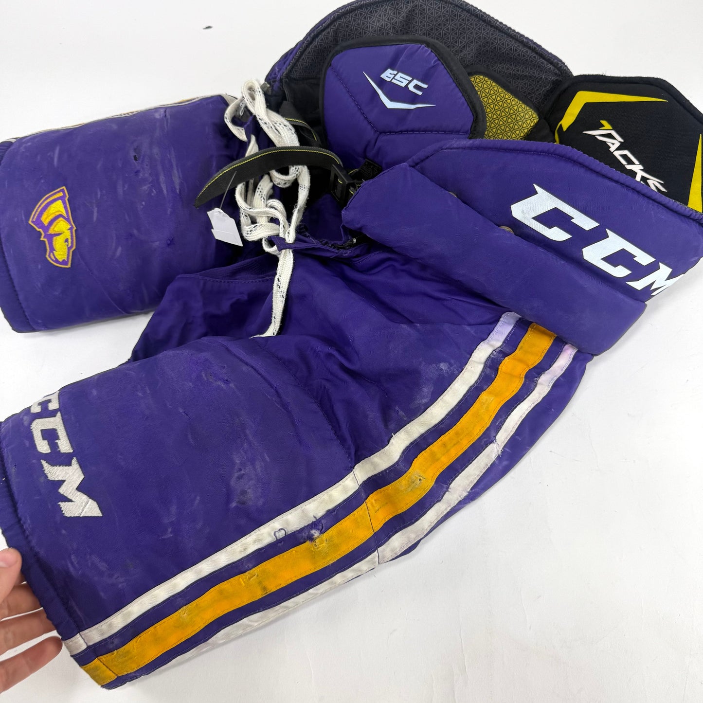 Used Purple/Yellow CCM Tacks 65C Pants | Small | E532