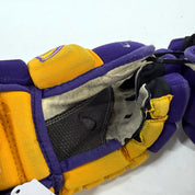 Used Yellow and Purple CCM 4 Roll Pro Gloves | 13" | E519
