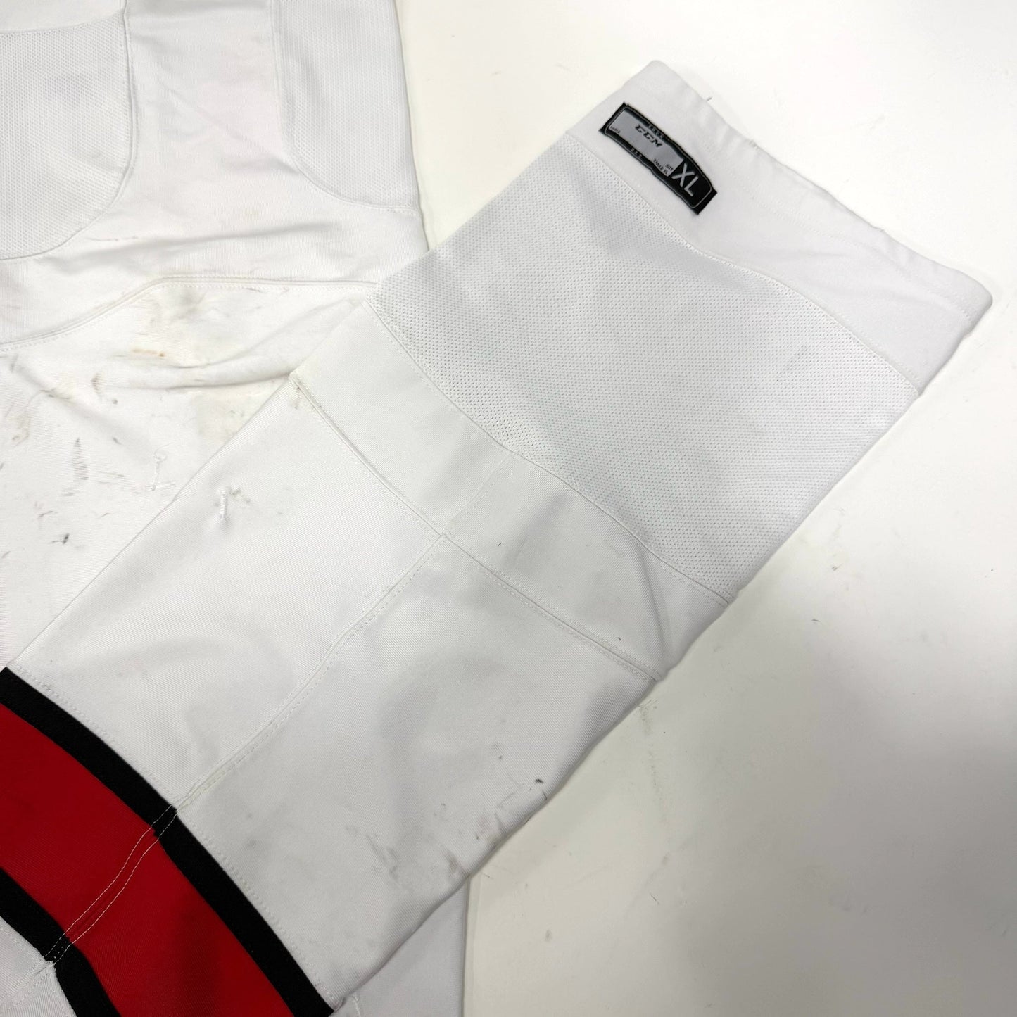 Used White with Red Stripe CCM Socks | XL | AB895