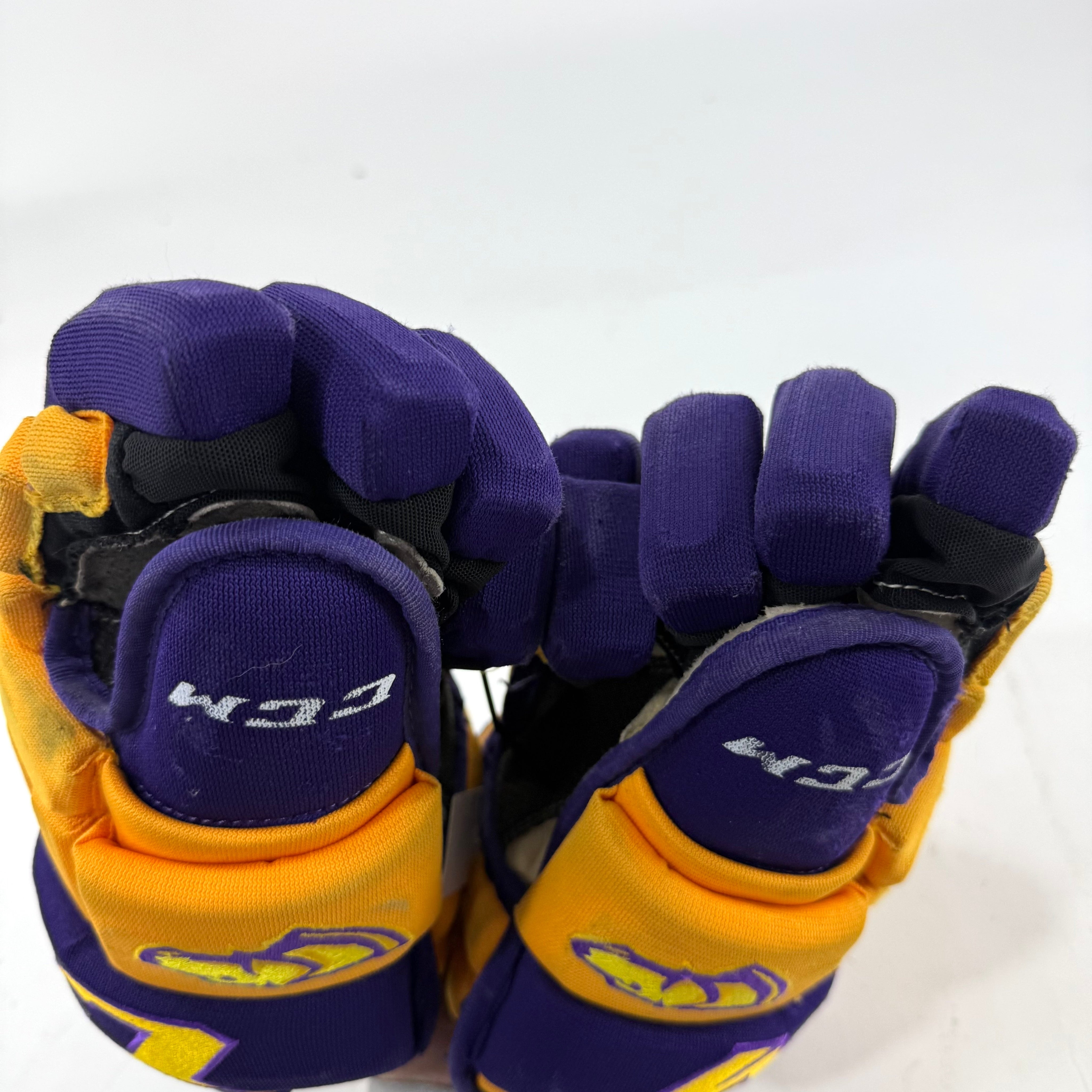 Used Yellow and Purple CCM 4 Roll Pro Gloves | 13" | E560