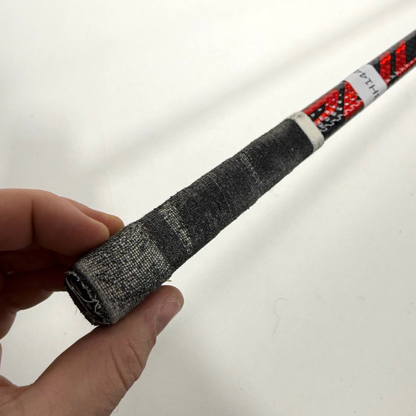 Used Left Red Bauer Pulse | 87 Flex P28 Curve Grip | Matt Gryzelcyk | BH144