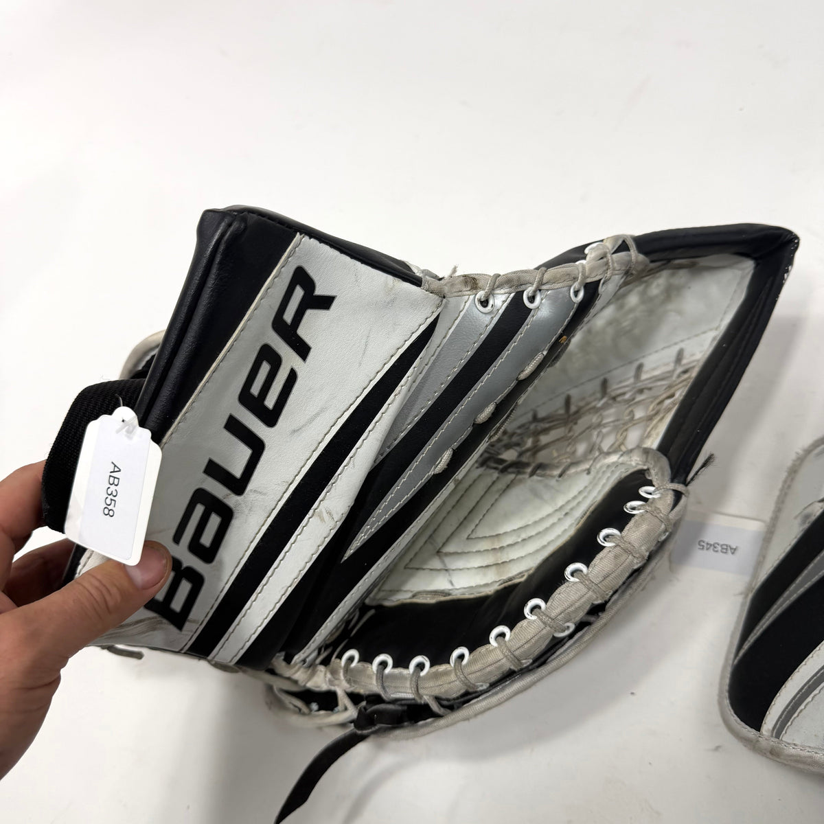 Used Black and White Regular Bauer Re-flex 6 Goalie Glove and Blocker | Junior