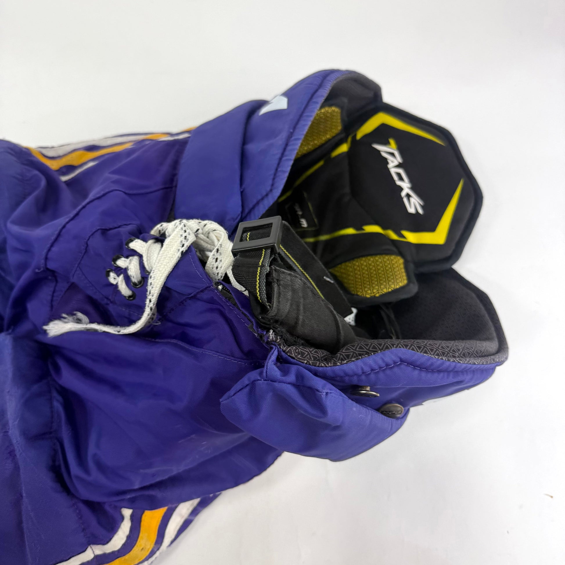 Used Purple/Yellow CCM Tacks 65C Pants | Medium | E541 - Top Flight Hockey