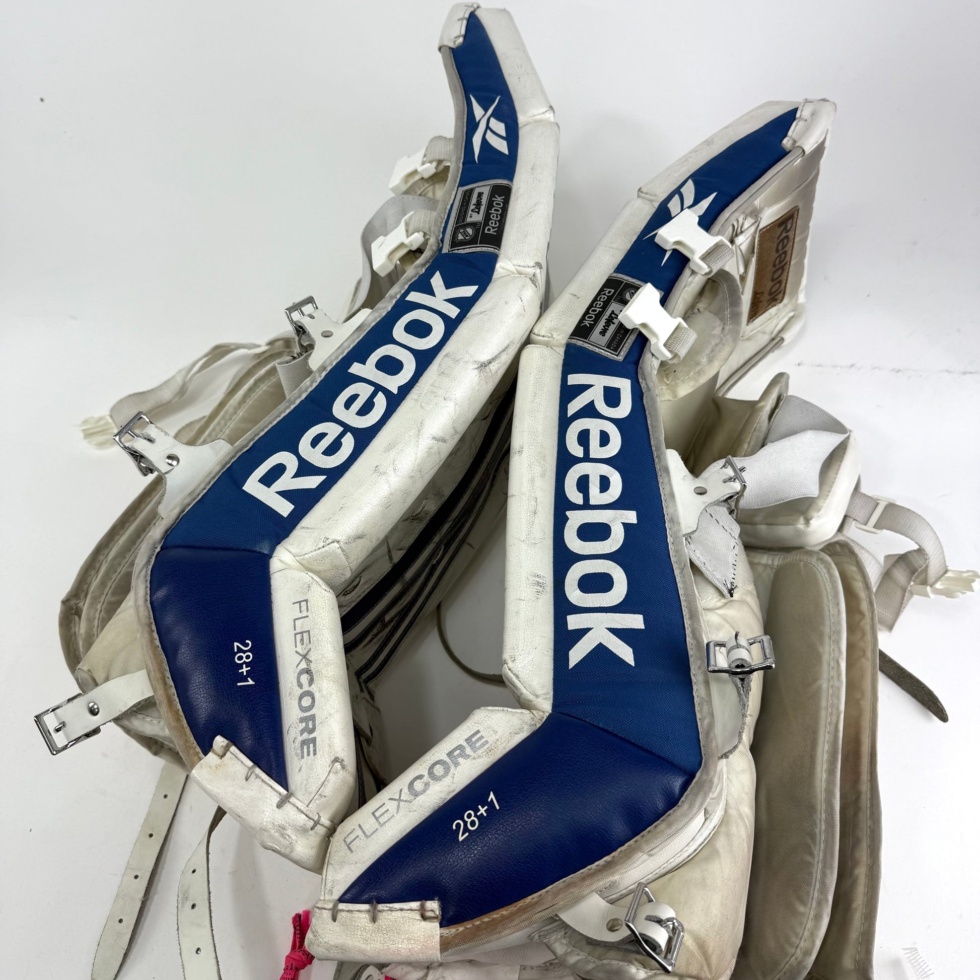 Used White and Blue Reebok 14K Junior Goalie Pads | 28+1" - Top Flight Hockey