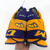 Used Yellow and Purple CCM 4 Roll Pro Gloves | 14" | E451
