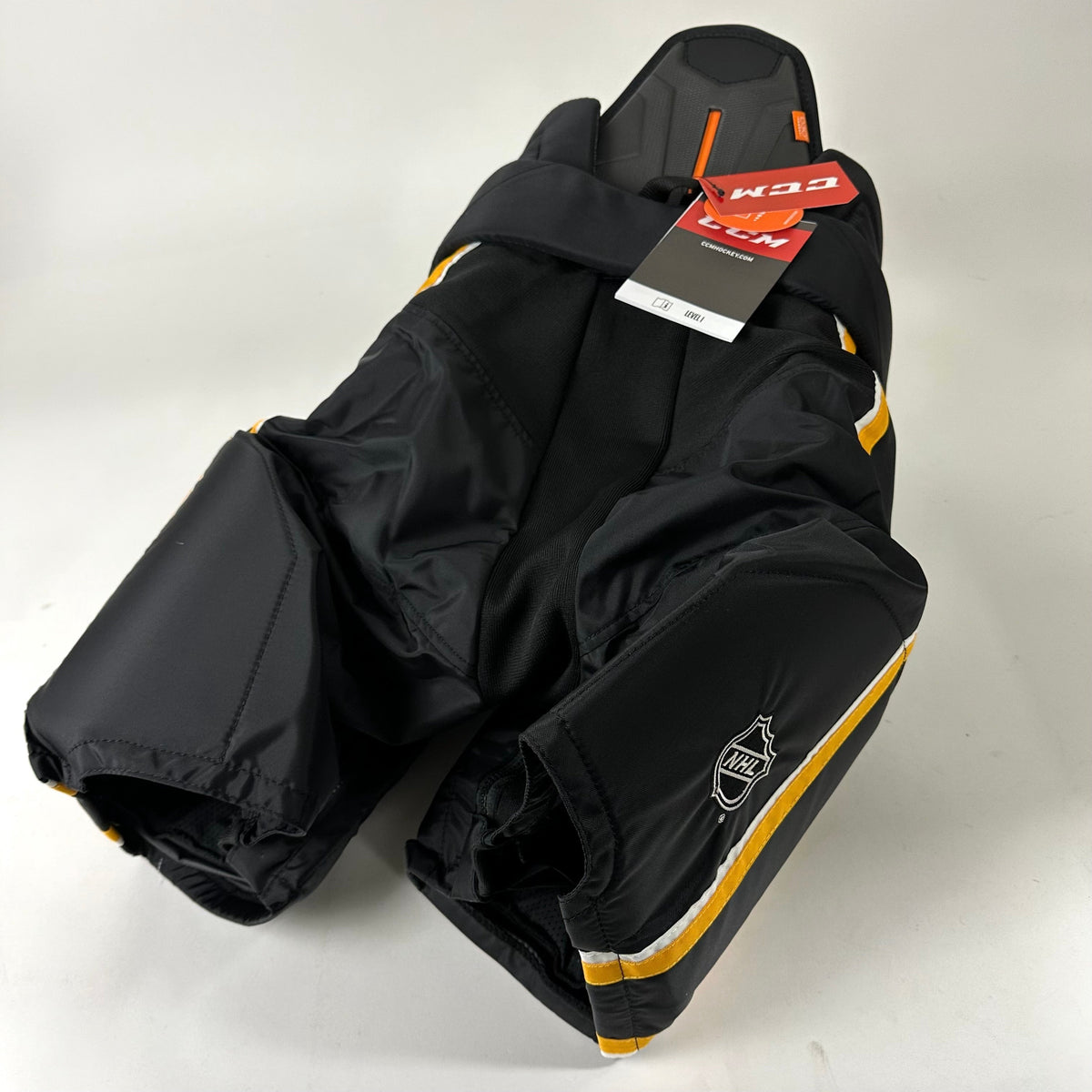 Brand New CCM HPTKXP Pro Pants - Third Calgary Flames - L+1 - Top Flight Hockey