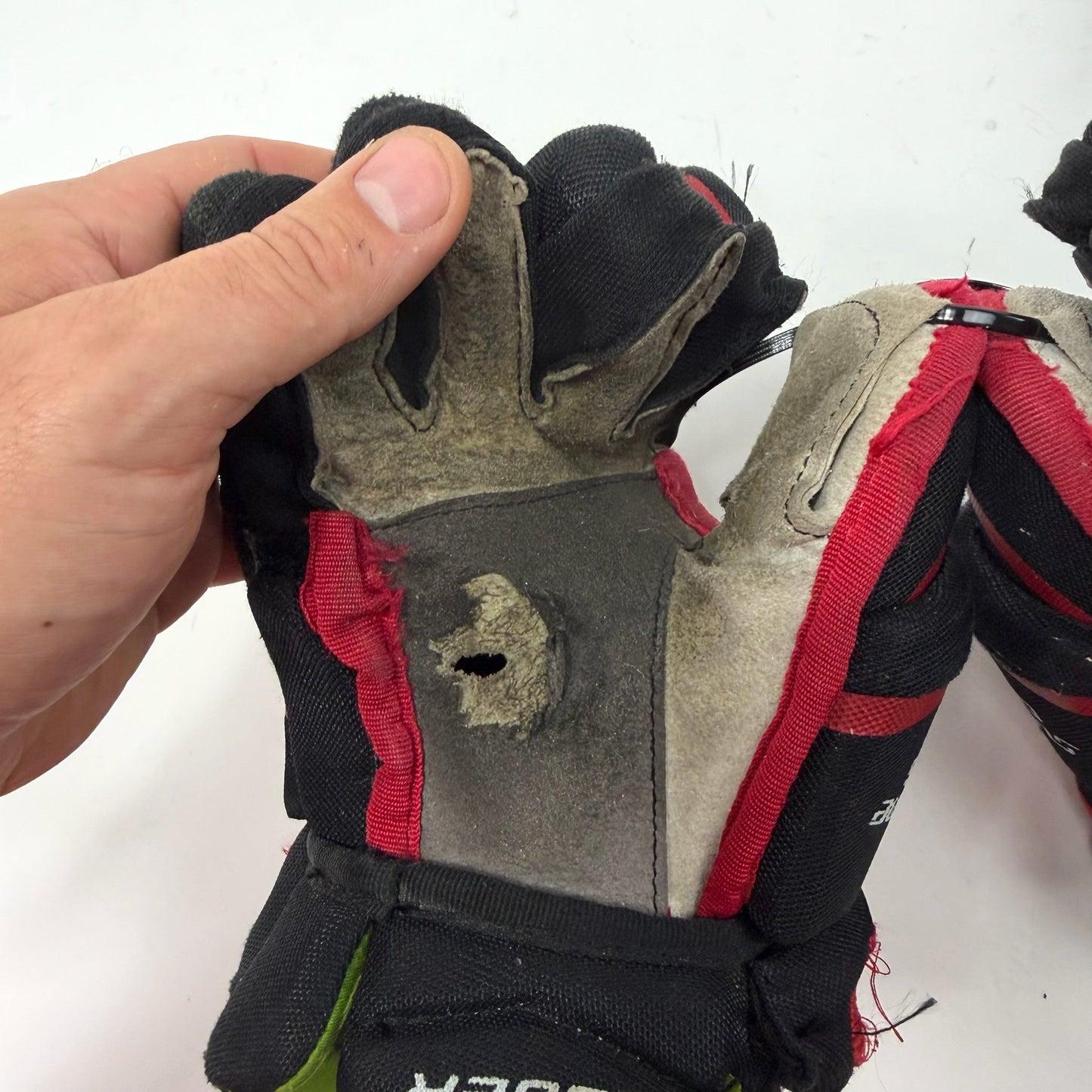 Used Black and Red Bauer Supreme ONE.6 Gloves | 10" | AB460