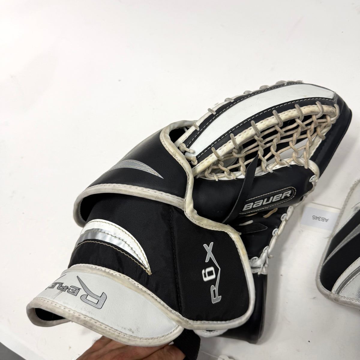 Used Black and White Regular Bauer Re-flex 6 Goalie Glove and Blocker | Junior