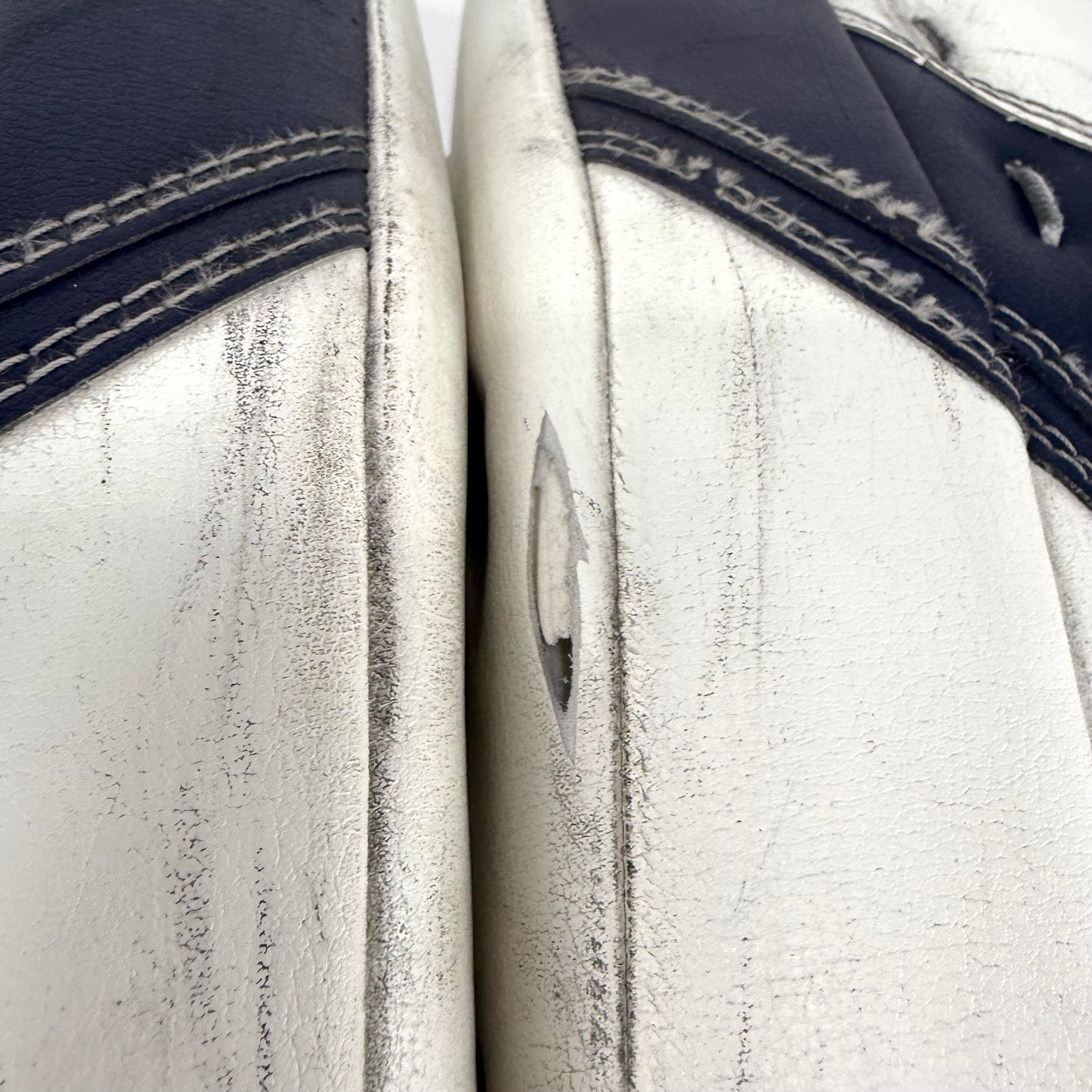 Used White and Navy Warrior Ritual G4 Goalie Pads | INT 31 +1" | U333