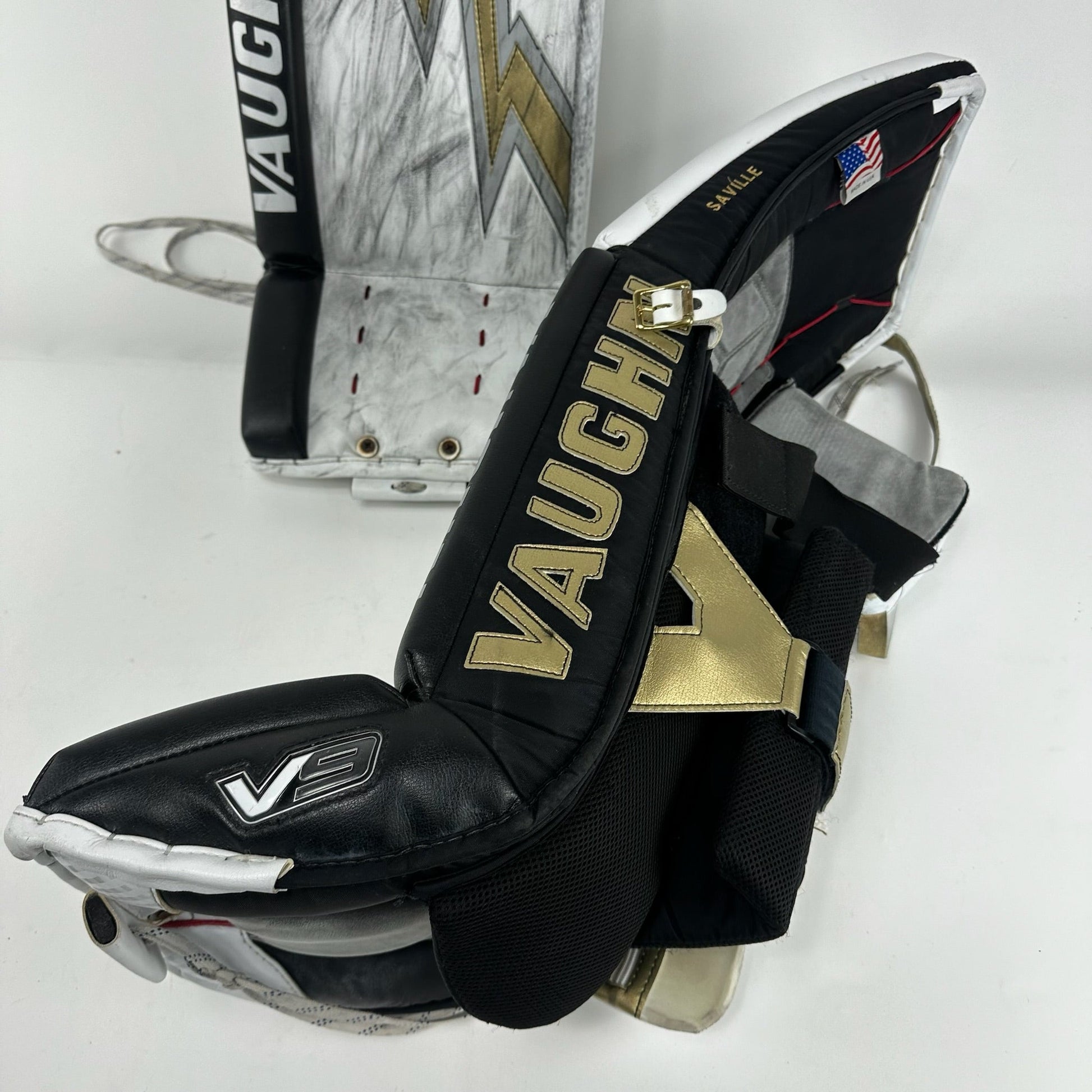 Used Vegas Knights White and Gold Vaughn V9 Goalie Leg Pads | Saville | 35+1" - Top Flight Hockey