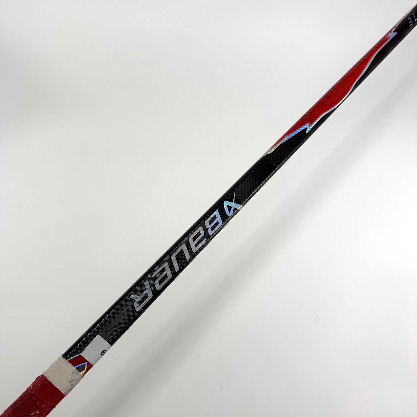 Used Left Red Bauer Flylite | 77 Flex P28M Curve Grip | A469 - Top Flight Hockey