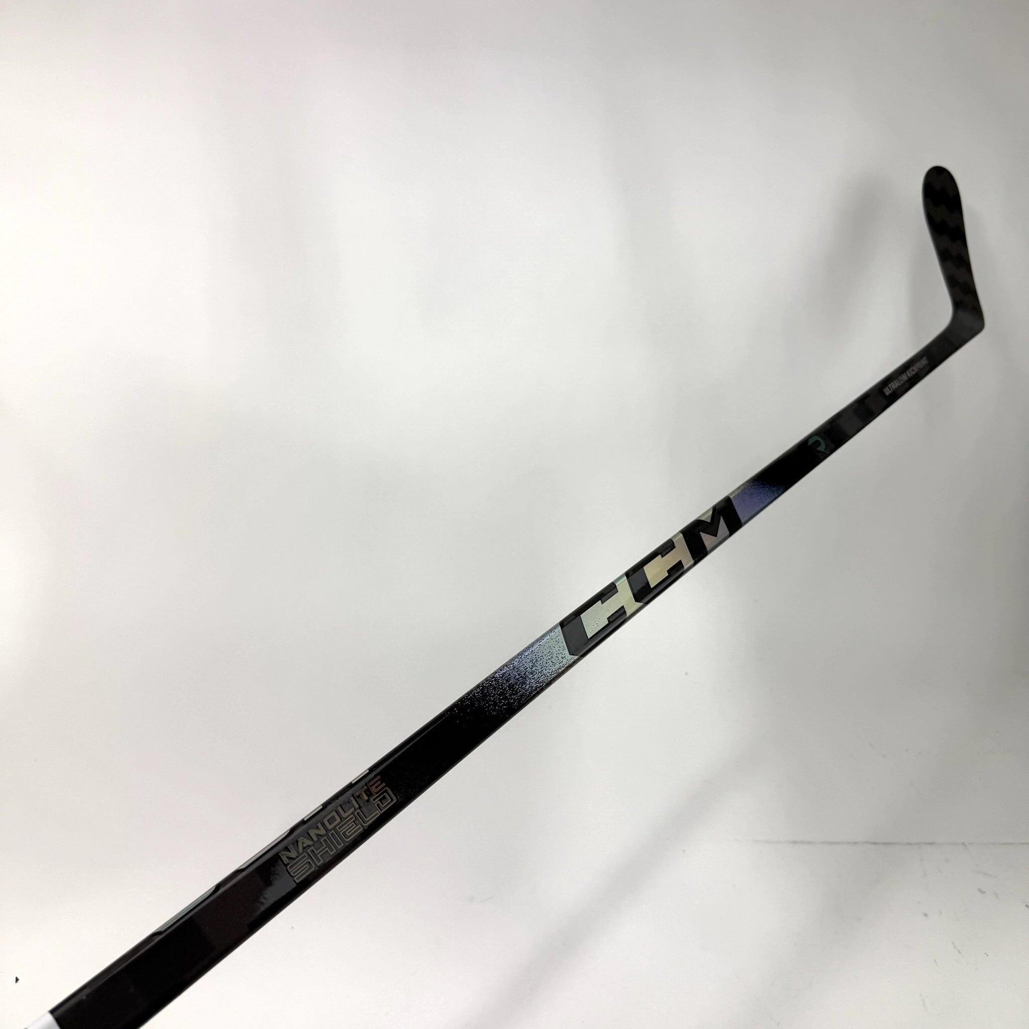 New Left CCM Ribcor Trigger 10 Pro | 55 Flex P28 Curve Grip | J228